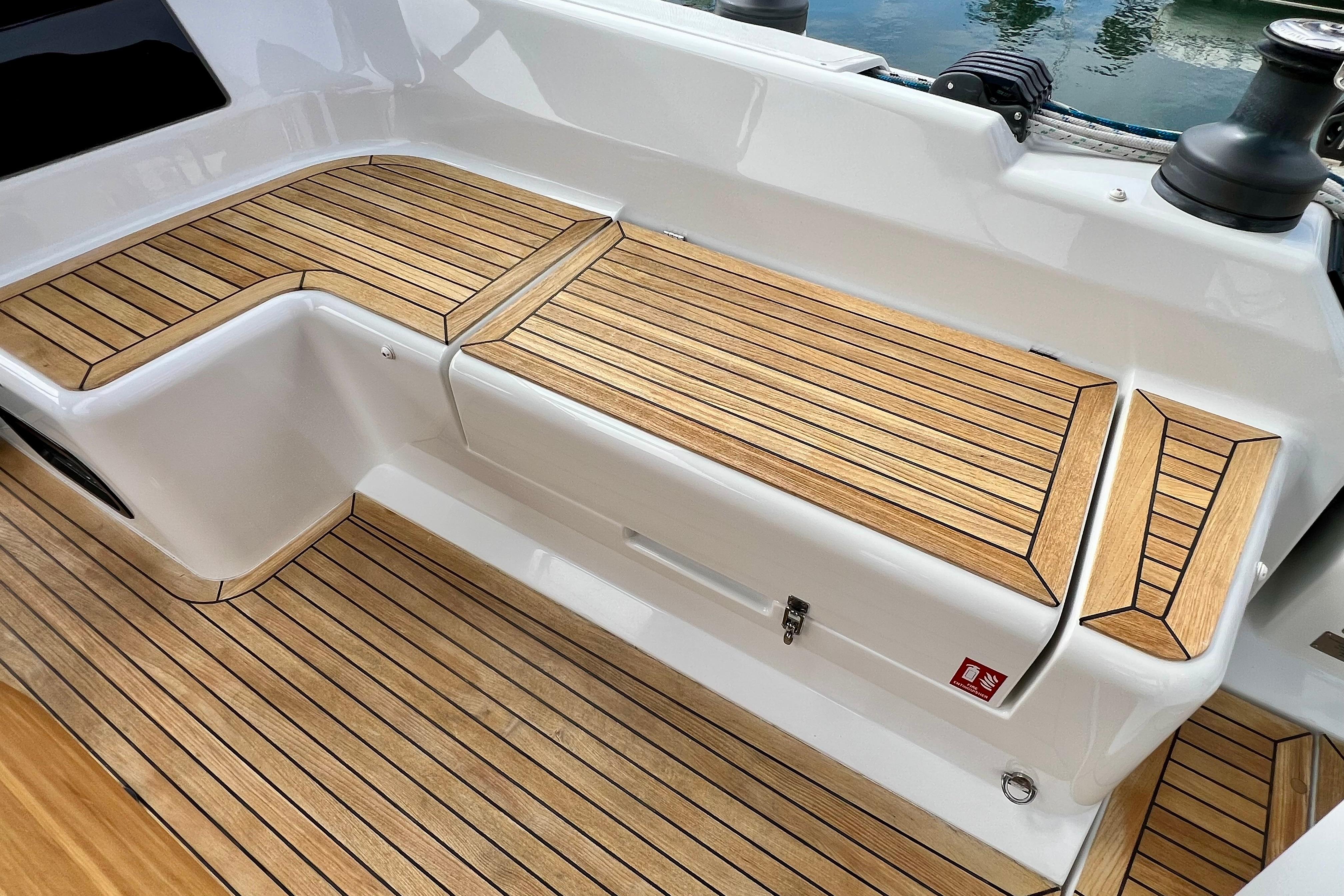 Teak deck seating on 2016 Hanse 455 yacht, showcasing elegant design and craftsmanship.