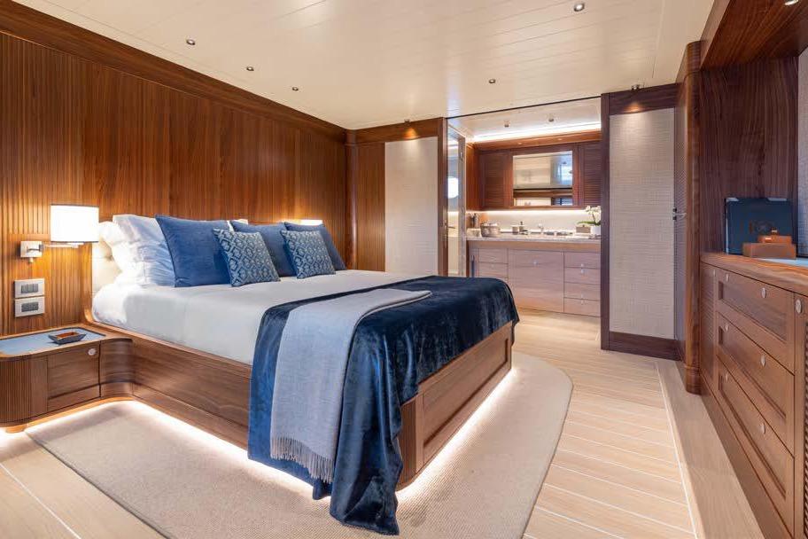 Luxurious bedroom interior of 2024 Cantiere Delle Marche Darwin 86 yacht.