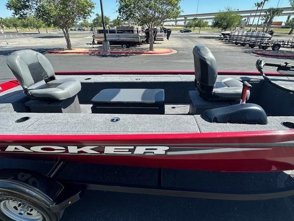 2025 Tracker Panfish 17 boat with seating, parked outdoors on a sunny day.