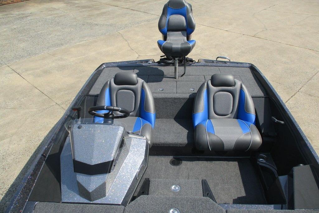 2022 Ranger Z185 boat interior with blue and gray seating, steering wheel, and console.