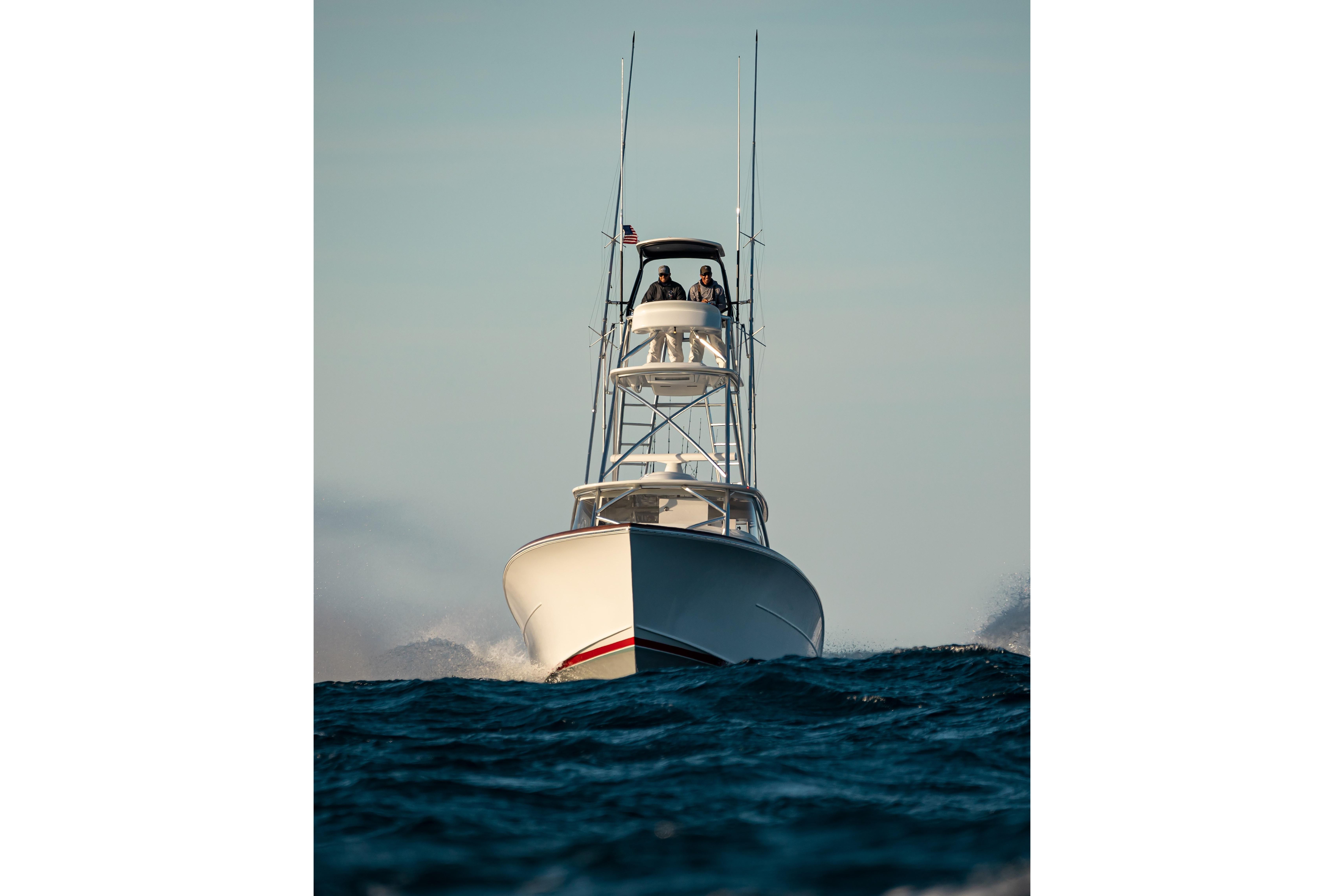 2026 Release Boatworks 46 Walkaround cruising on open water, viewed from the front.