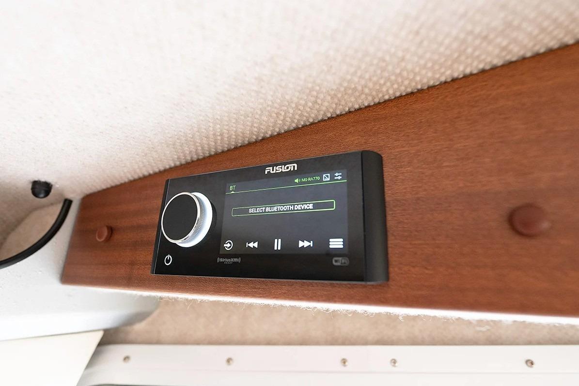Fusion audio system in 2026 KingFisher 3225 GFX Offshore boat interior.