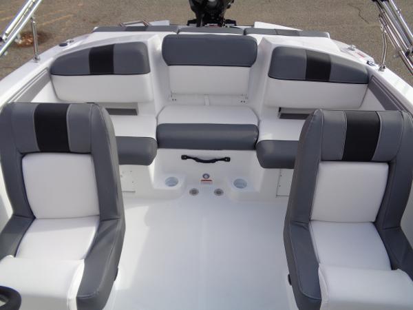 2024 Tahoe T21 boat interior with gray and white seating.