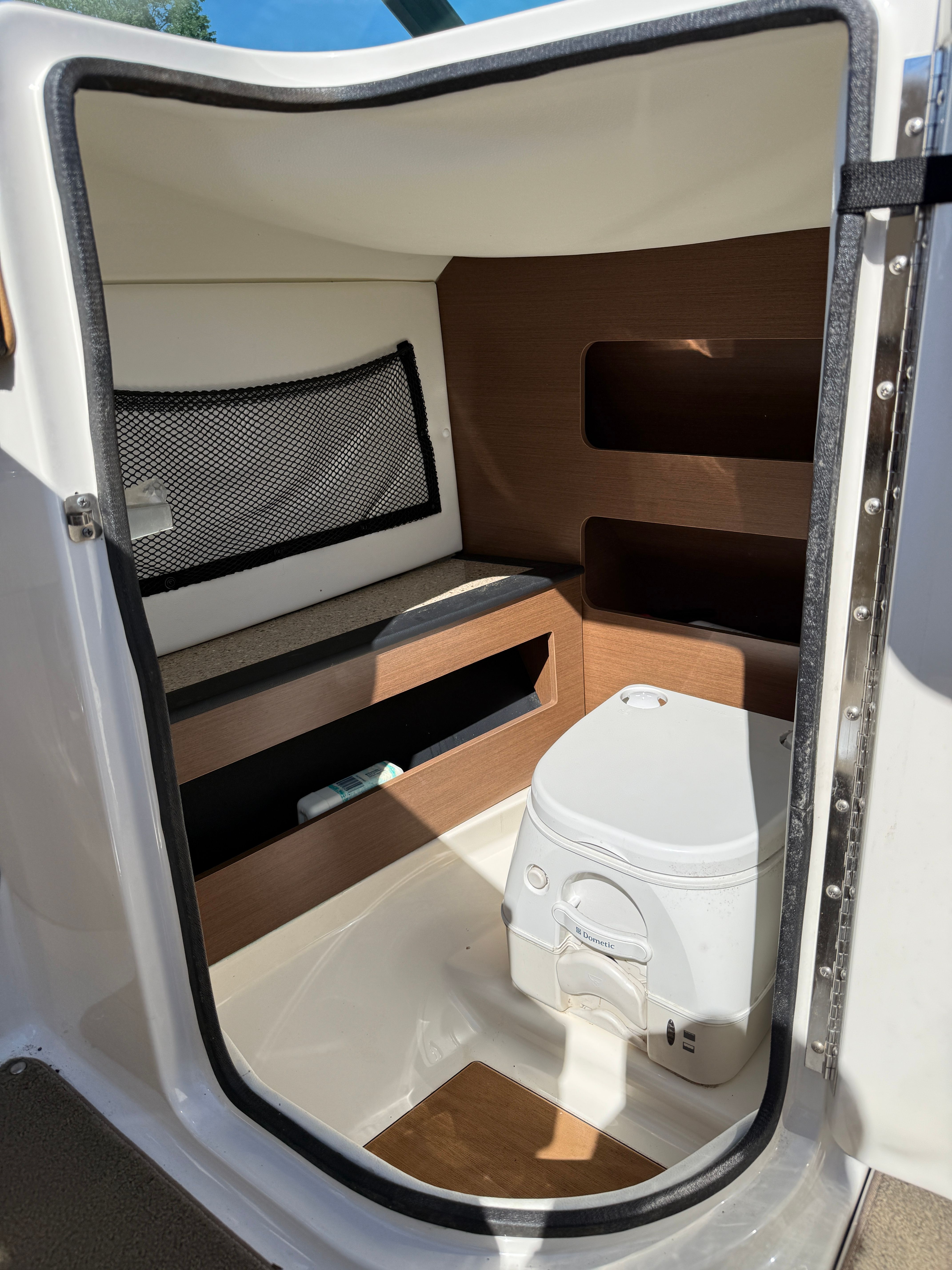 Interior of 2015 Sea Ray 220 Sundeck OB with toilet.