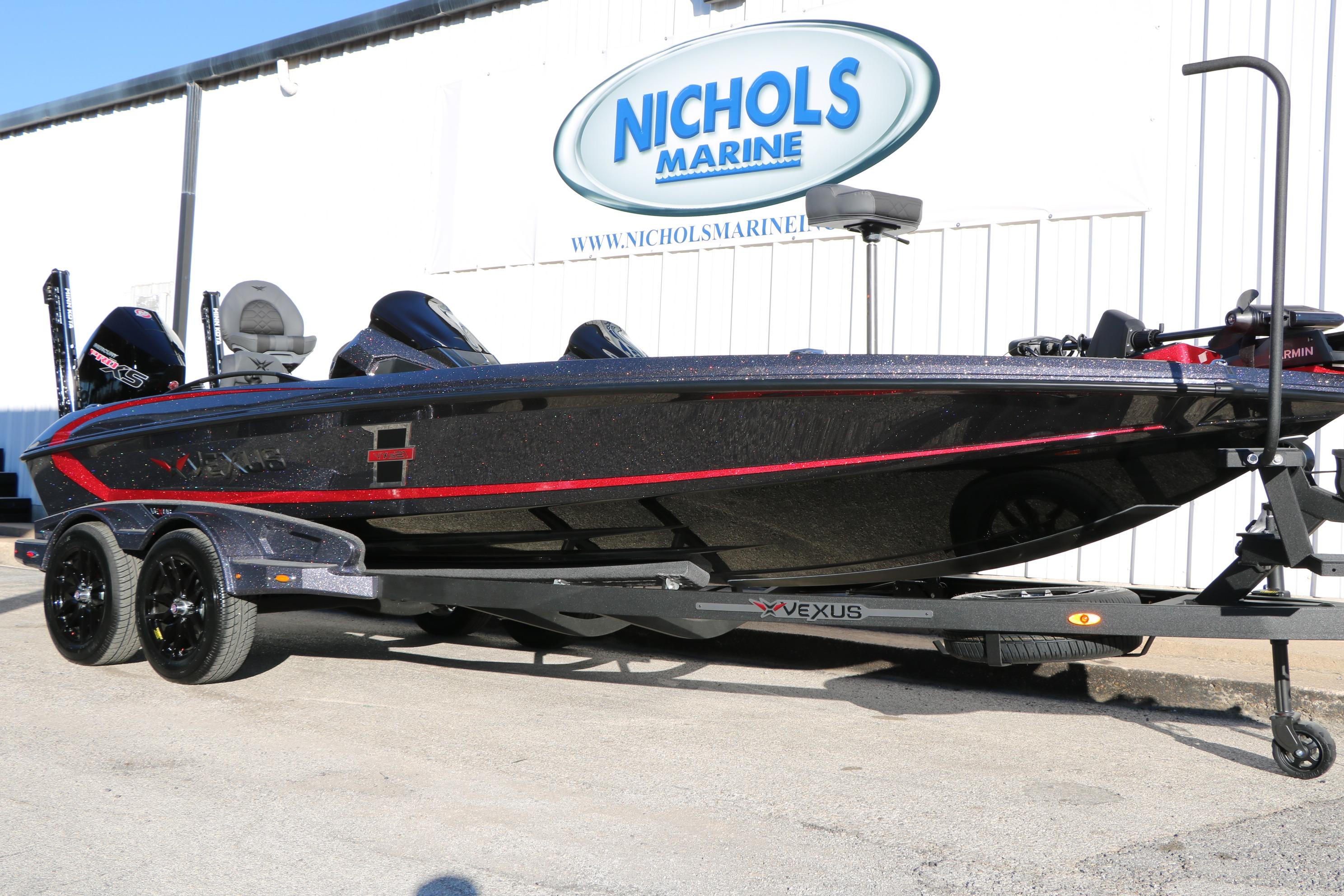 2026 Vexus VXs21 boat on trailer at Nichols Marine dealership.