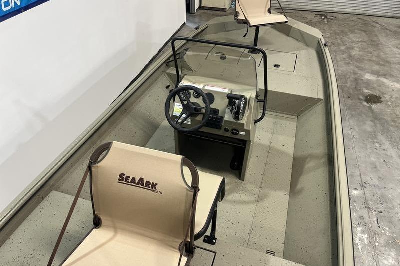 2025 SeaArk Shadow 18T boat interior with steering console and seating.
