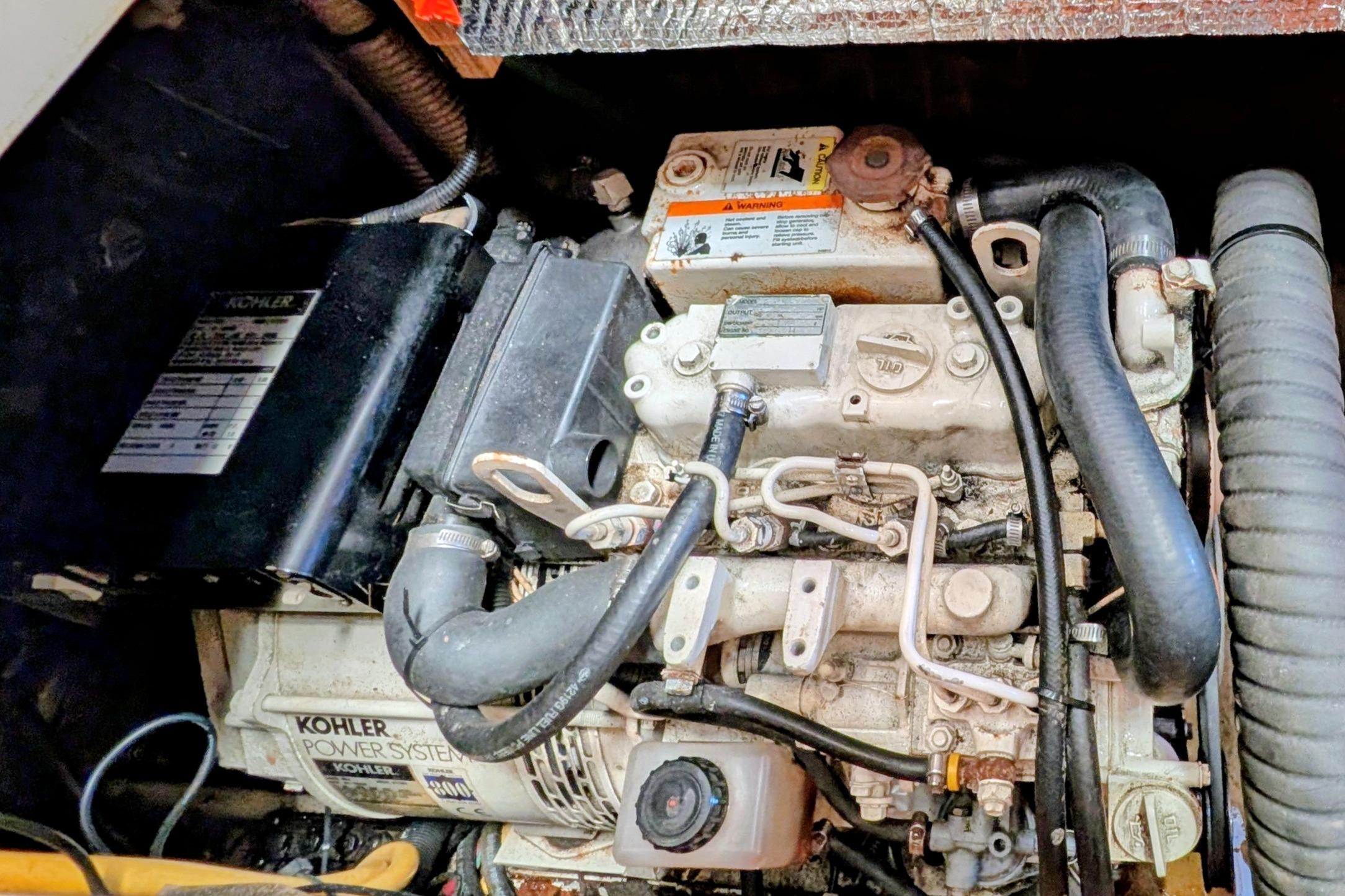 Engine compartment of a 2002 Hunter 450 Passage sailboat with Kohler power system.