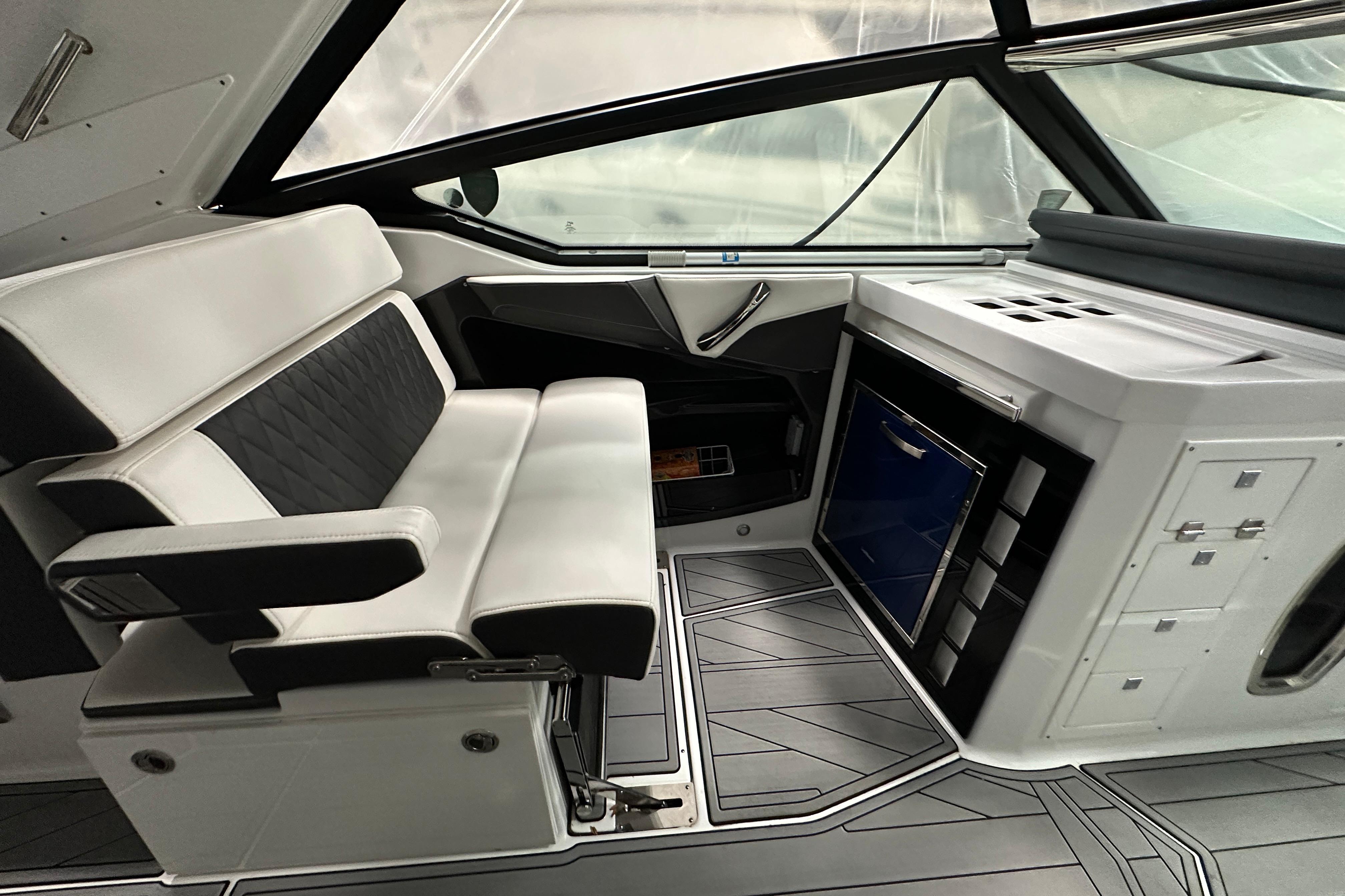 Interior of 2023 Monterey 378SS Super Sport boat with sleek seating and modern design.
