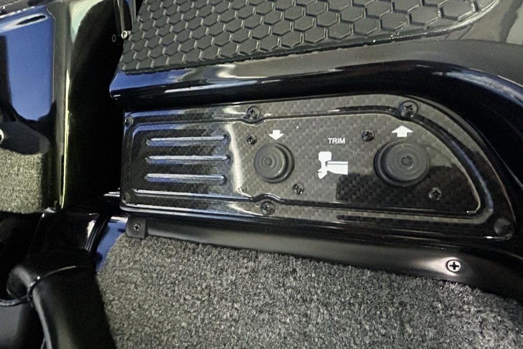 Control panel of 2026 Phoenix 819 ZXL with trim adjustment buttons.