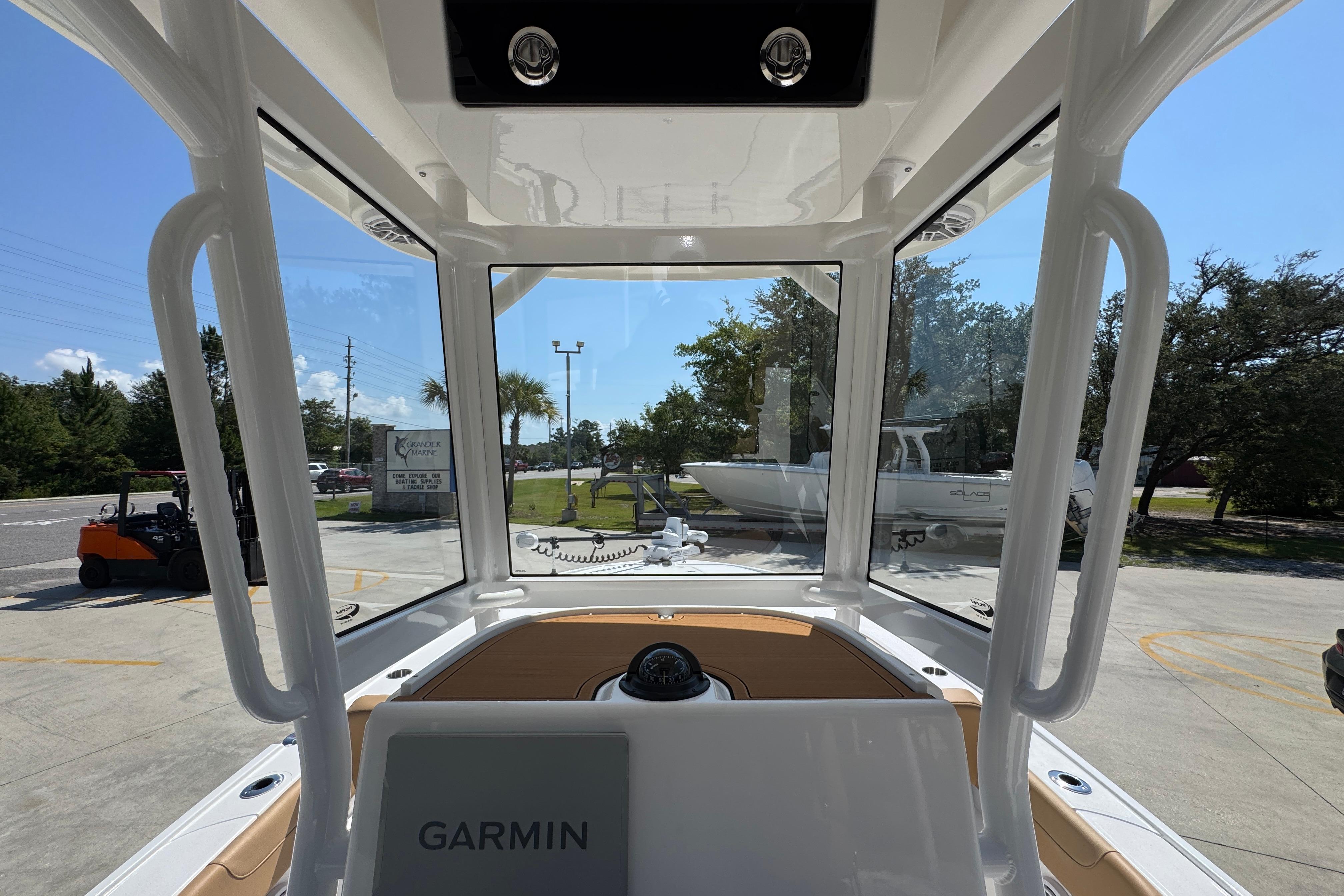 Interior view of 2027 Caymas 26 HB boat with Garmin navigation system.