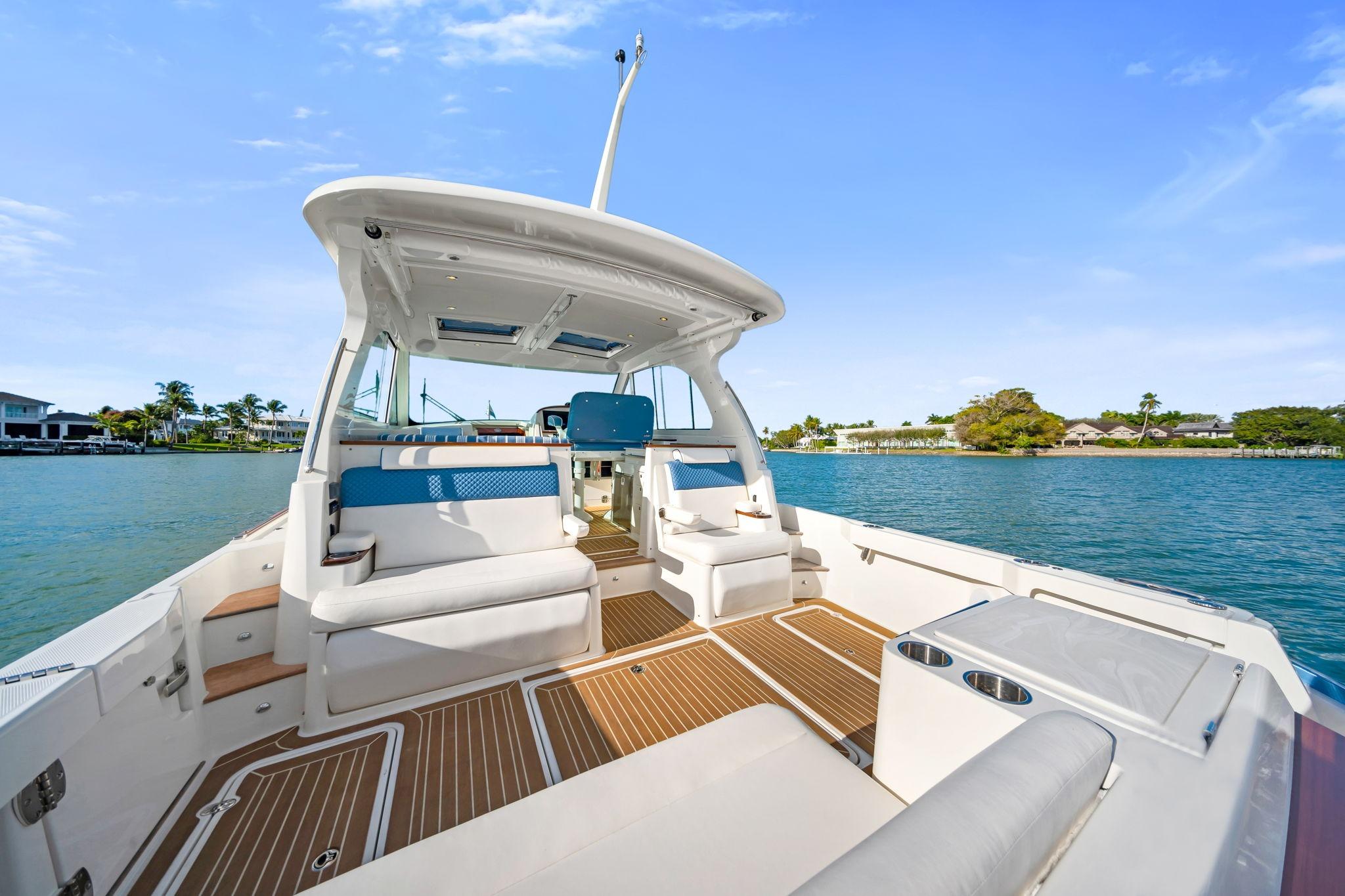 2025 Hinckley Sport Boat 40 X on water, featuring spacious deck and modern design.