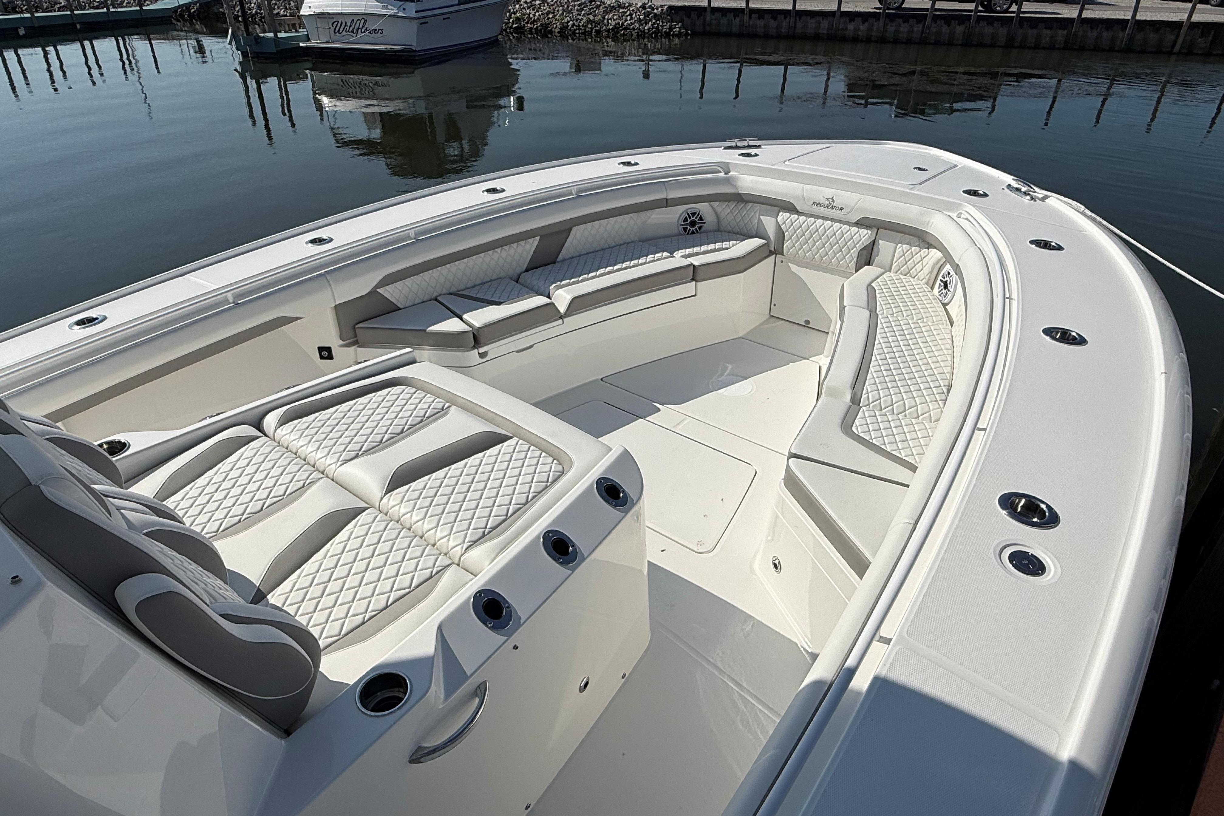 Luxurious 2026 Regulator 35 boat with spacious seating and elegant design at the dock.