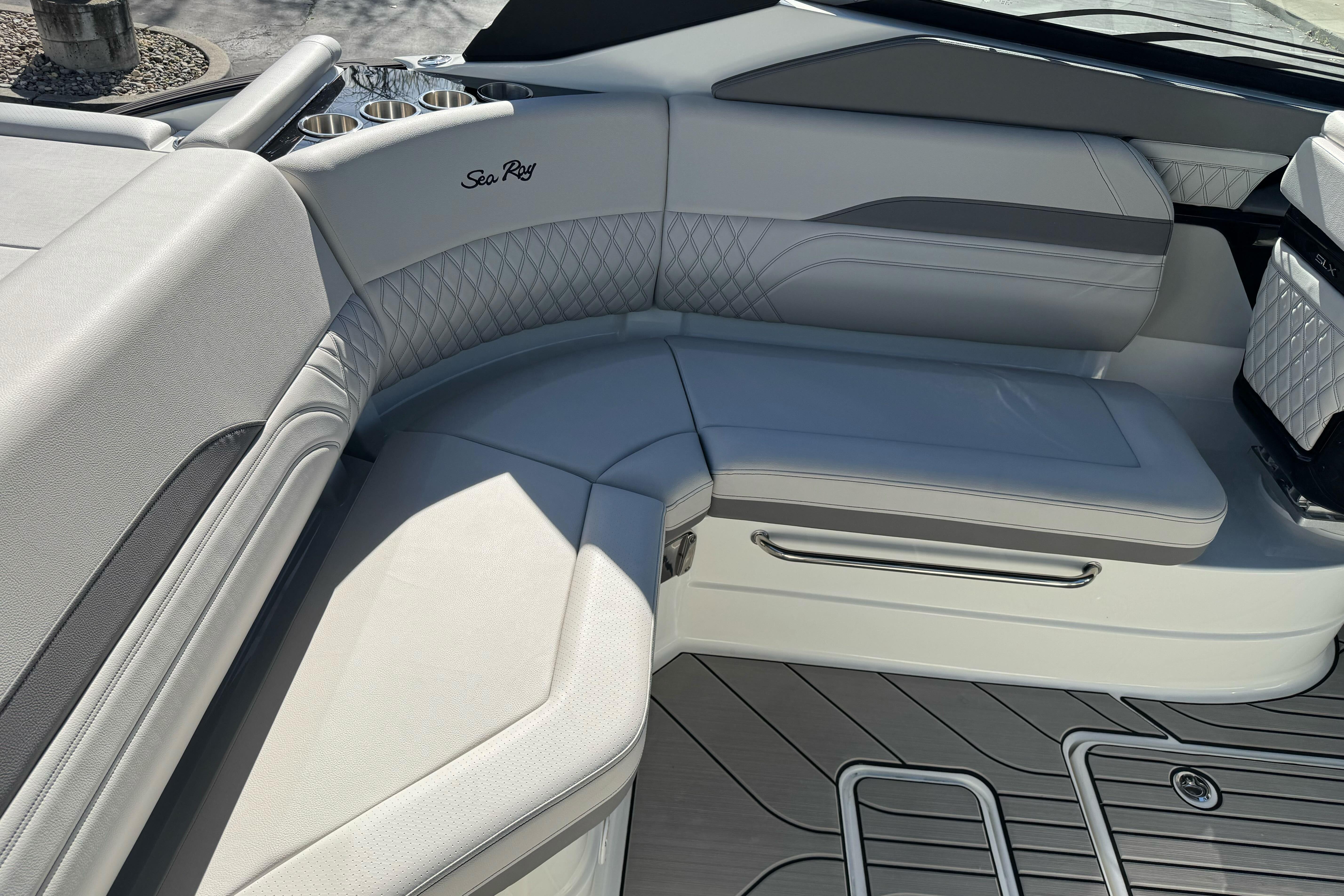 Luxurious seating on 2026 Sea Ray SLX 260 boat, featuring elegant design and premium materials.
