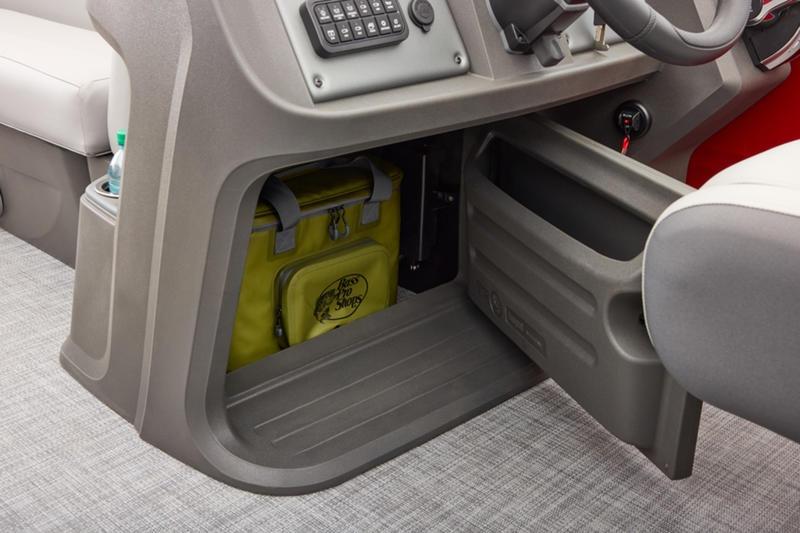 2026 Sun Tracker Party Barge 22 DLX console with storage and cooler.