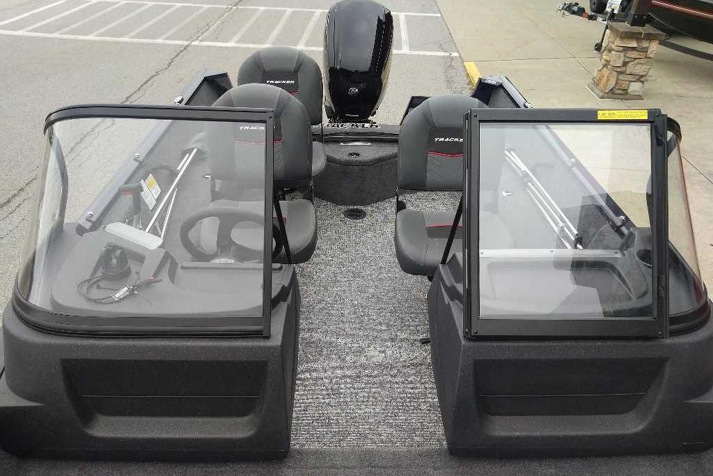 2026 Tracker Pro Guide V-16 WT boat interior with seating and windshield.