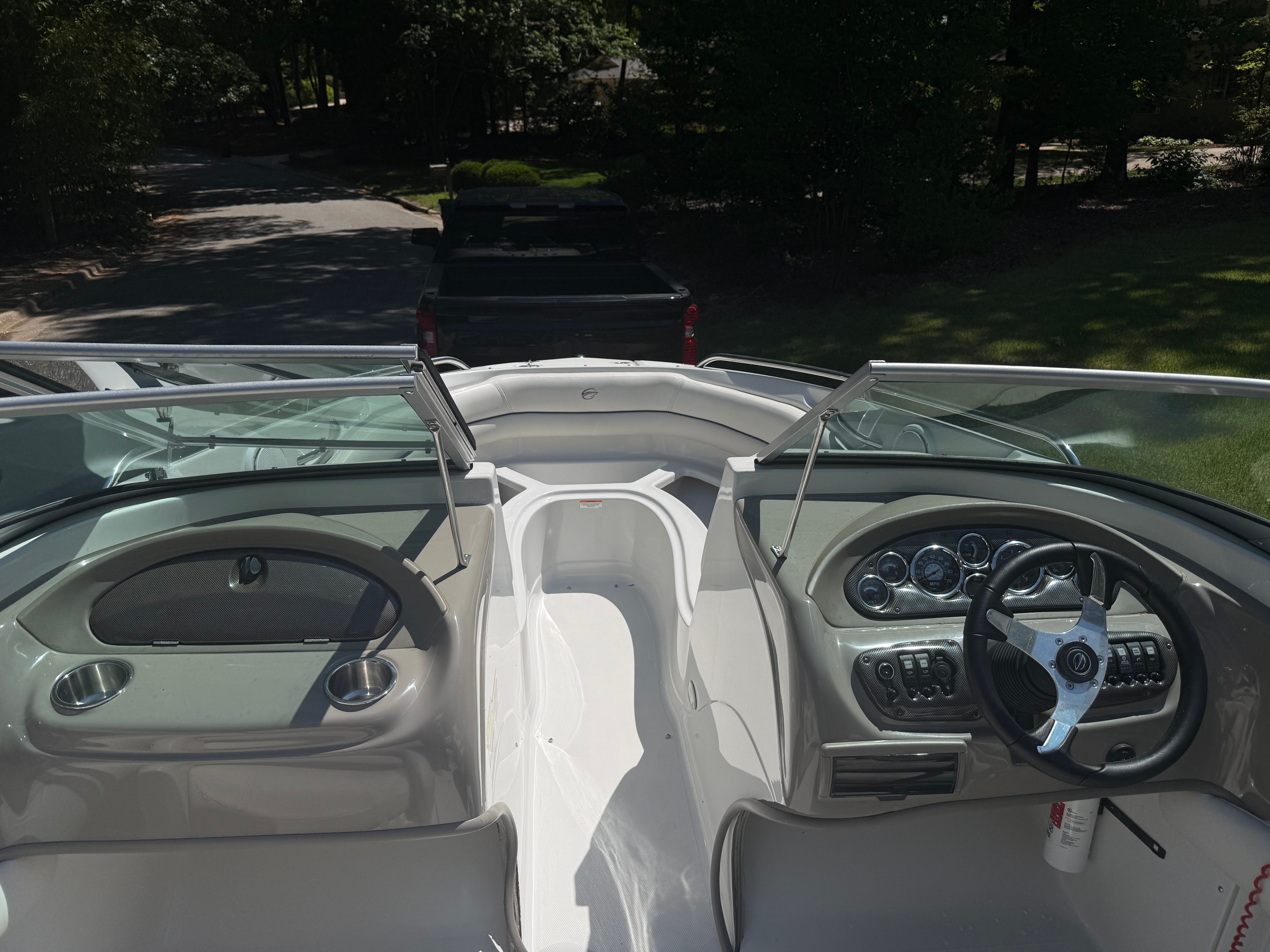 Interior view of a 2008 Crownline 210 LX boat with dashboard.