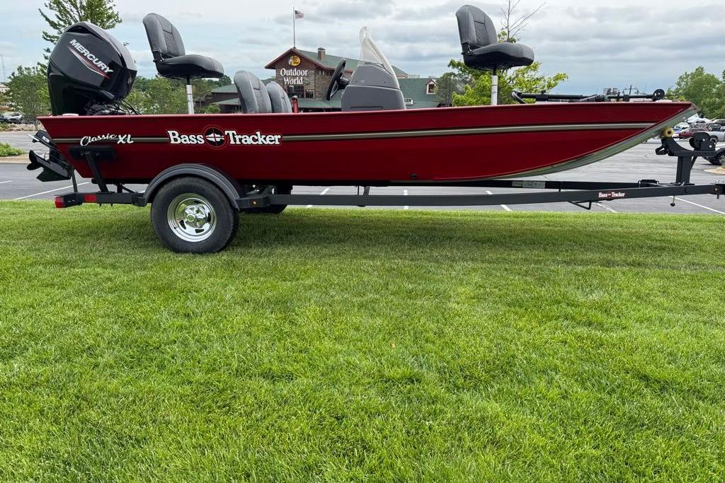 2026 Tracker Bass Tracker Classic XL boat on trailer, parked on grass.