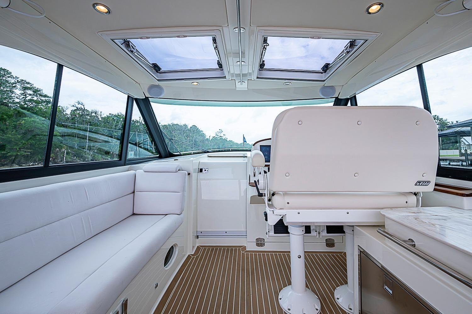 Interior of 2023 Hinckley Sport Boat 40 X, featuring luxurious seating and modern design.
