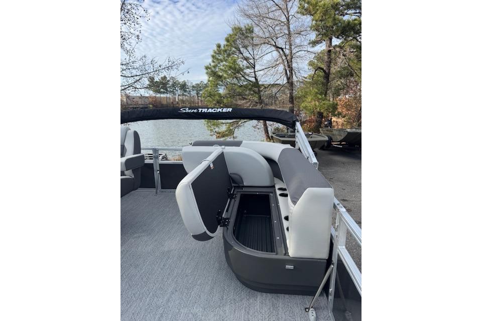 2026 Sun Tracker Bass Buggy 16 XL Select pontoon boat interior with seating and storage.