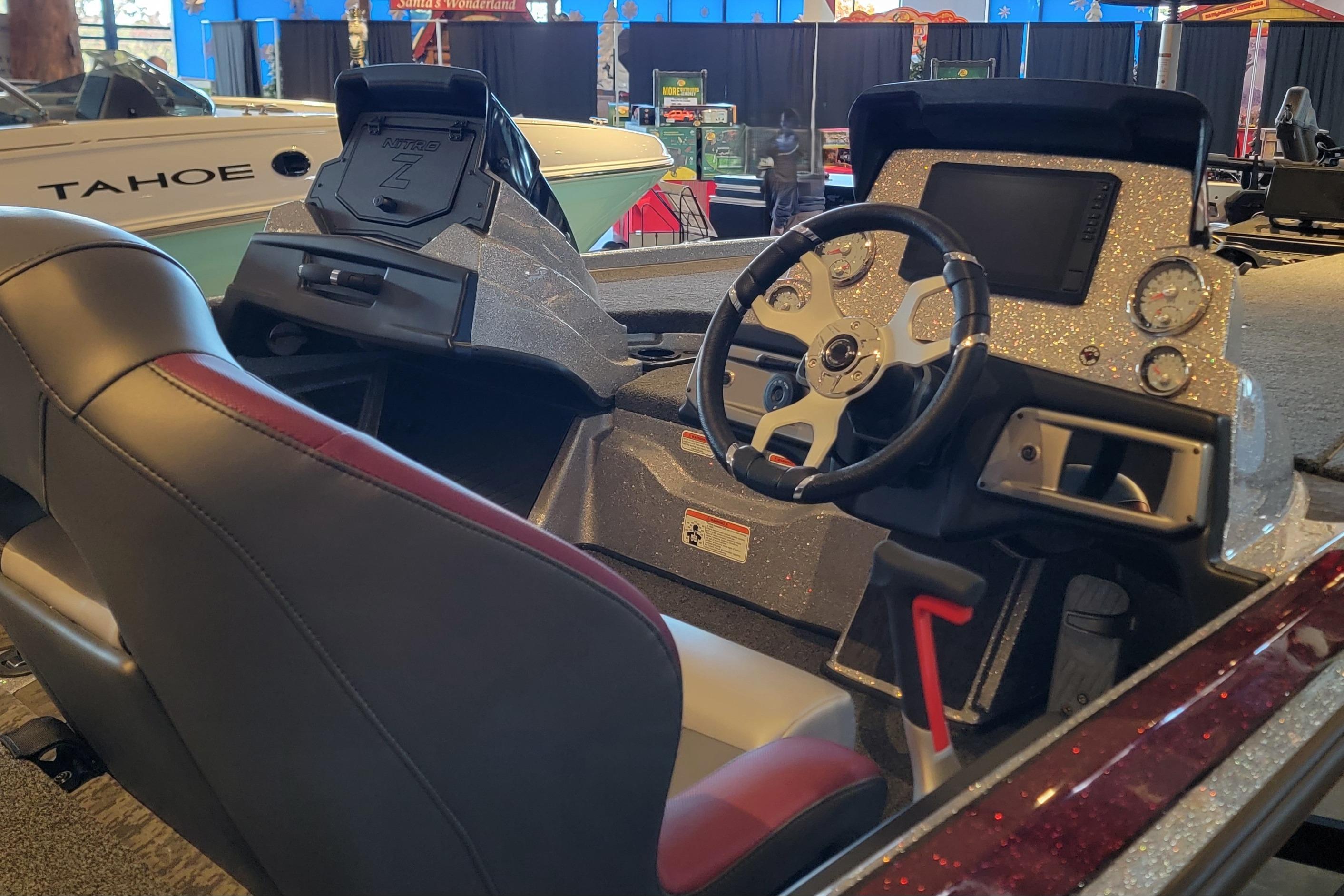 Interior of 2025 Nitro Z20 XL Pro boat with modern dashboard and steering wheel.