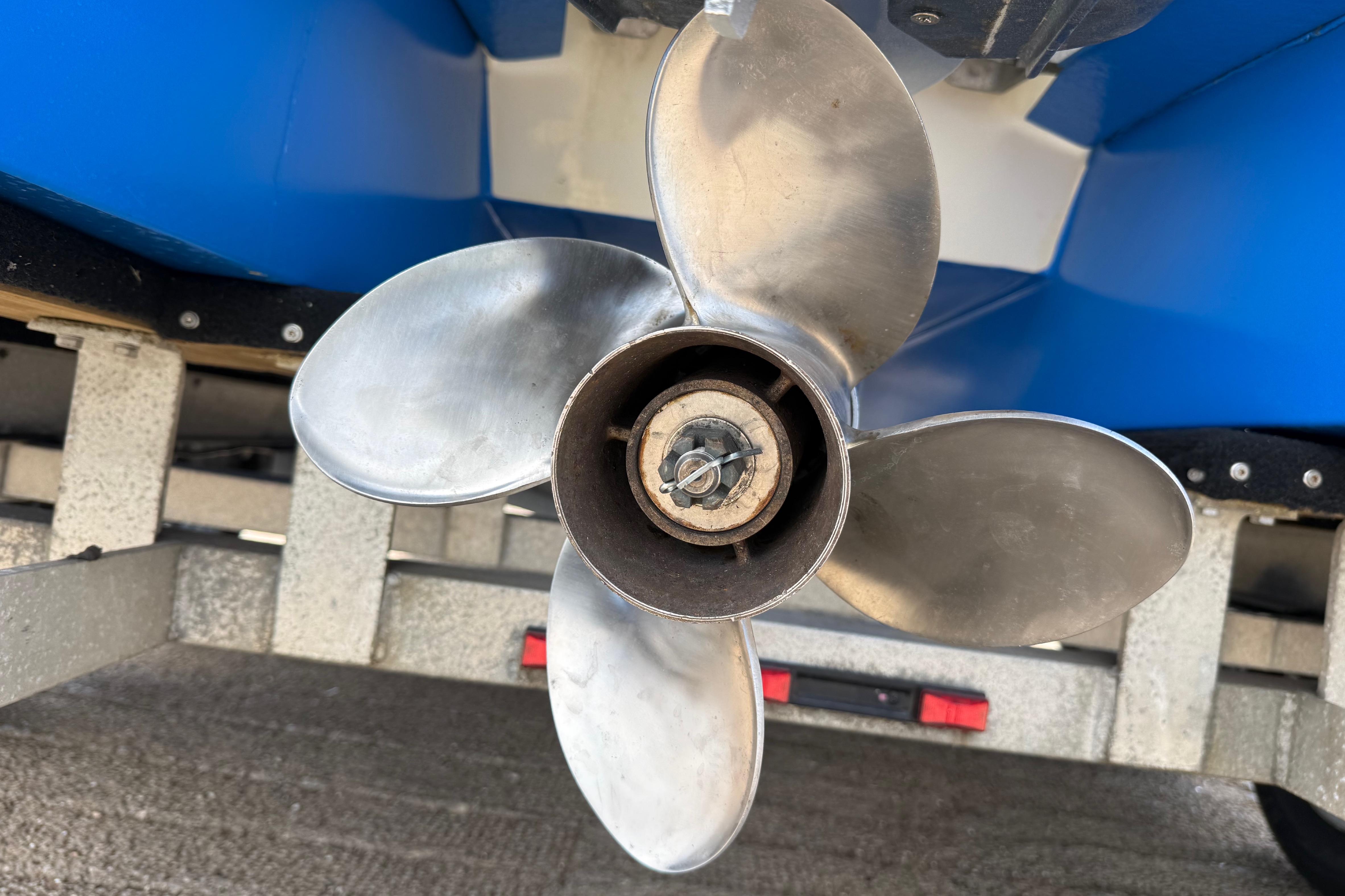 Close-up of a boat propeller on a 2007 Flats Cat 19 model.