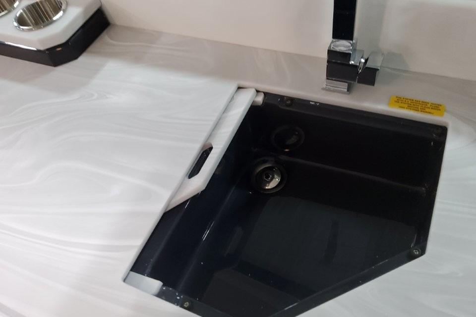 Modern sink and faucet in 2026 Formula 380 Super Sport Crossover OB boat.