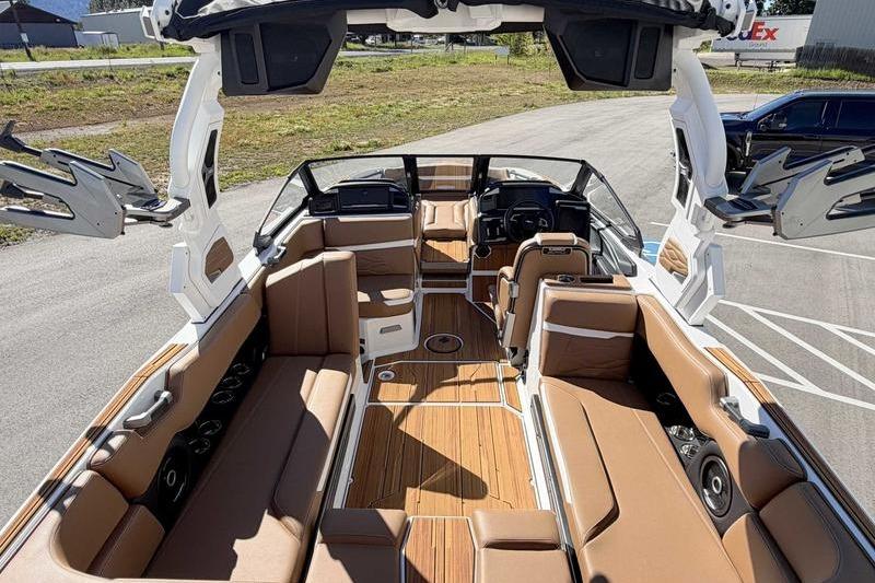 Luxurious interior of a 2026 Supra SL boat with spacious seating and modern design.