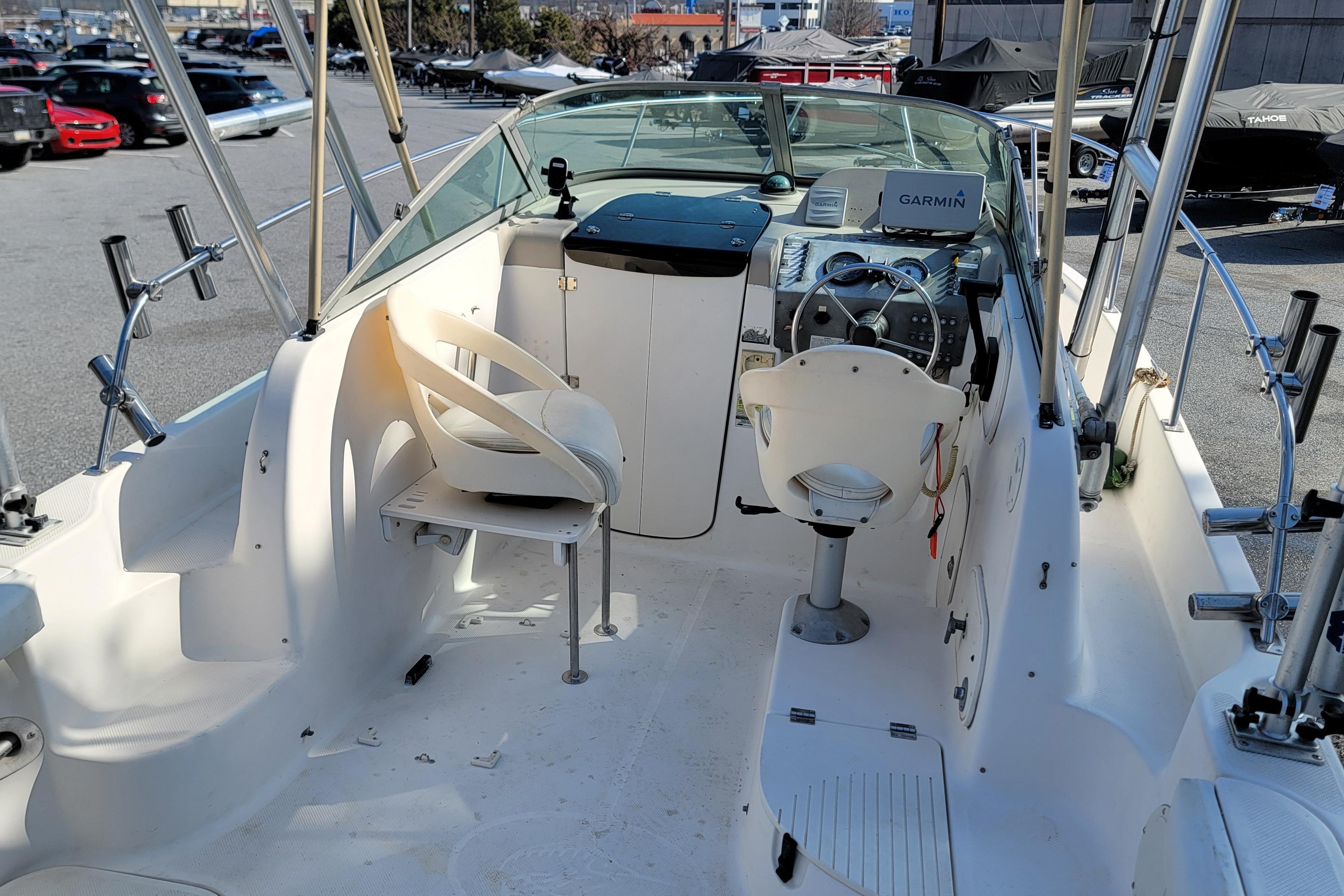 2003 Trophy 2002 Walkaround boat interior with steering console and seating.