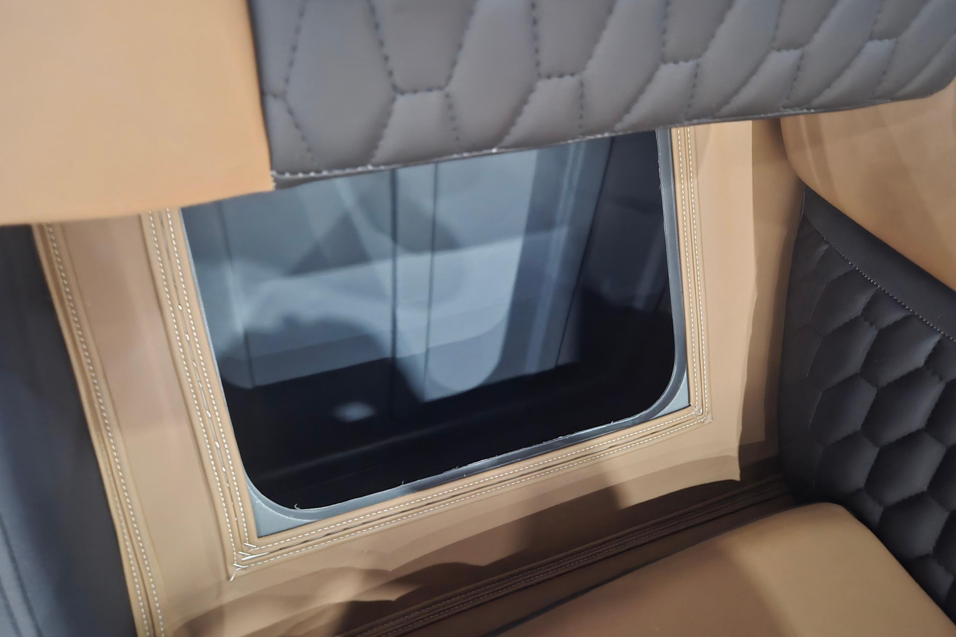 Luxurious interior detail of 2026 Sylvan L3 SLZ with quilted leather upholstery.