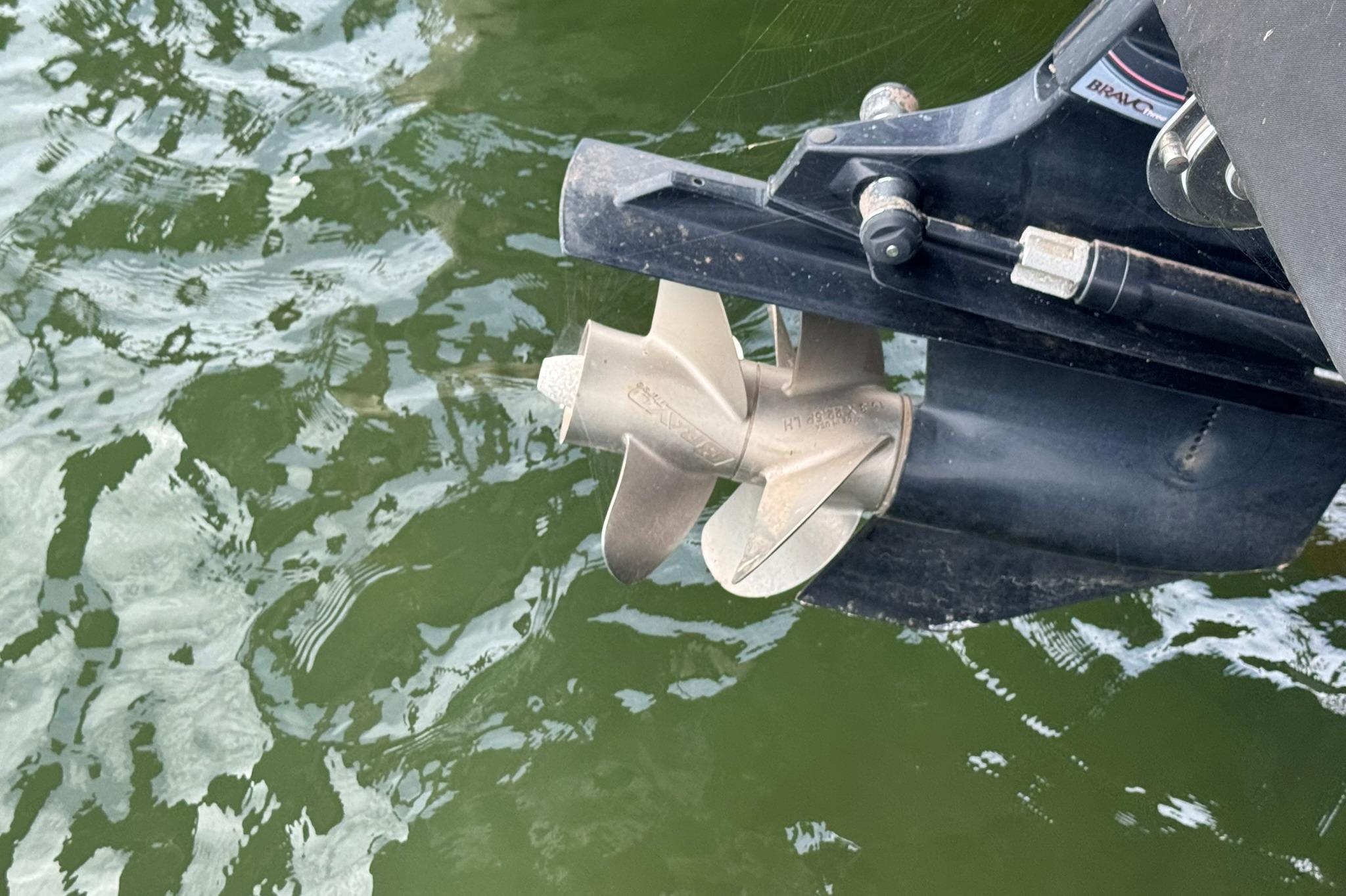 Propeller of a 2021 Sea Ray SPX 230 boat in water.