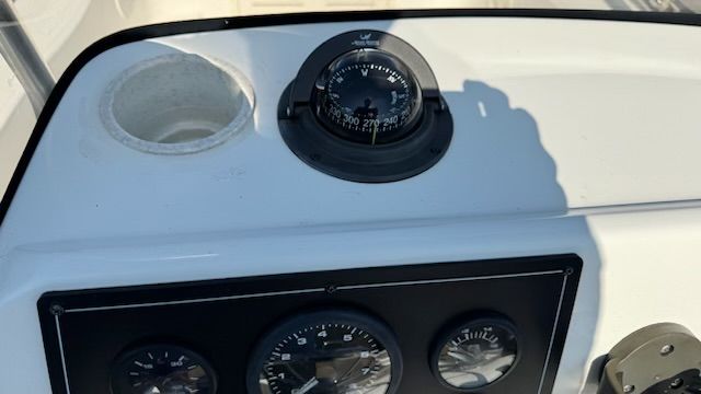Compass and gauges on Mako 171 Center Console boat.