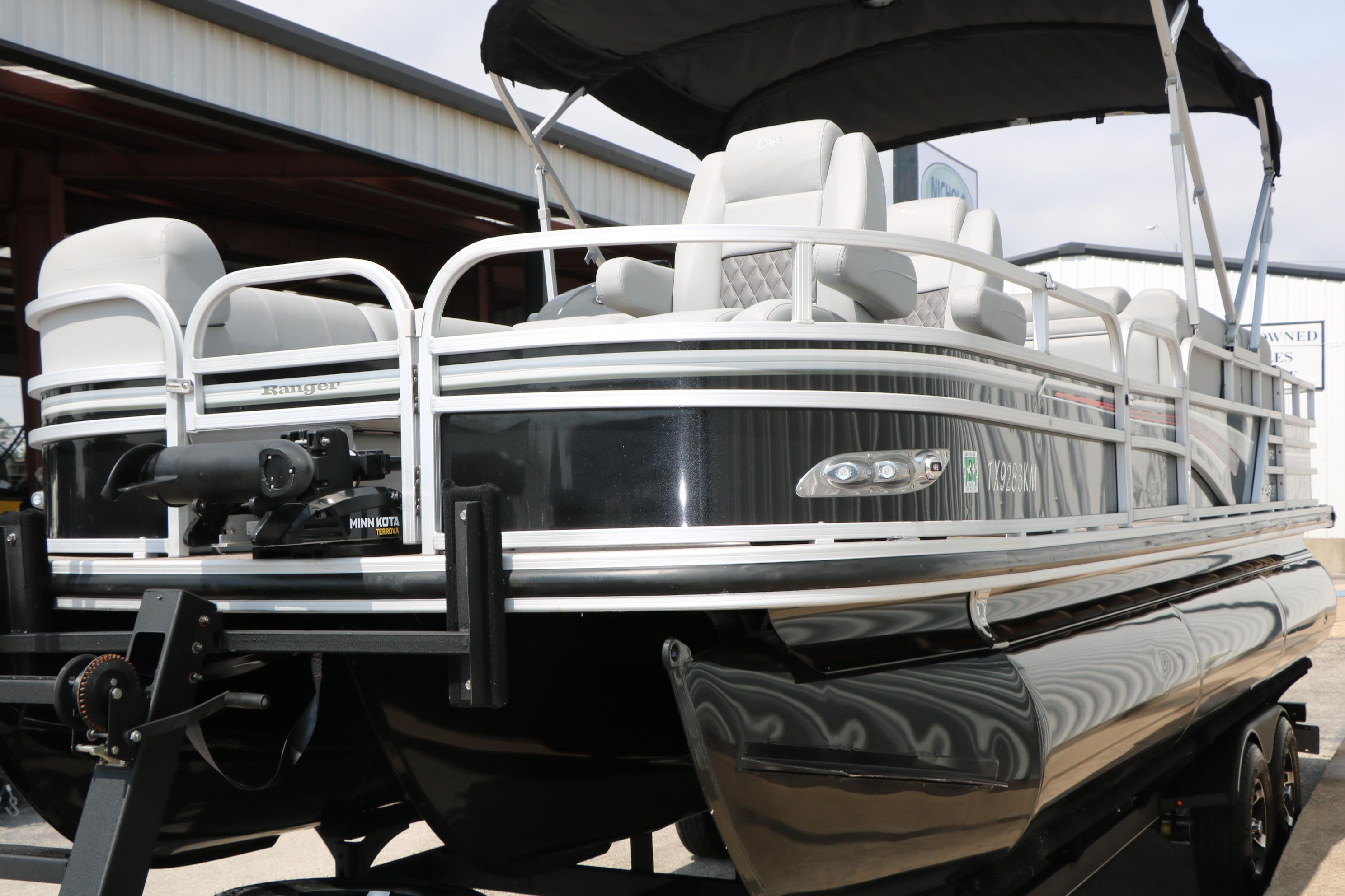 2021 Ranger 223FC pontoon boat with sleek design and comfortable seating.