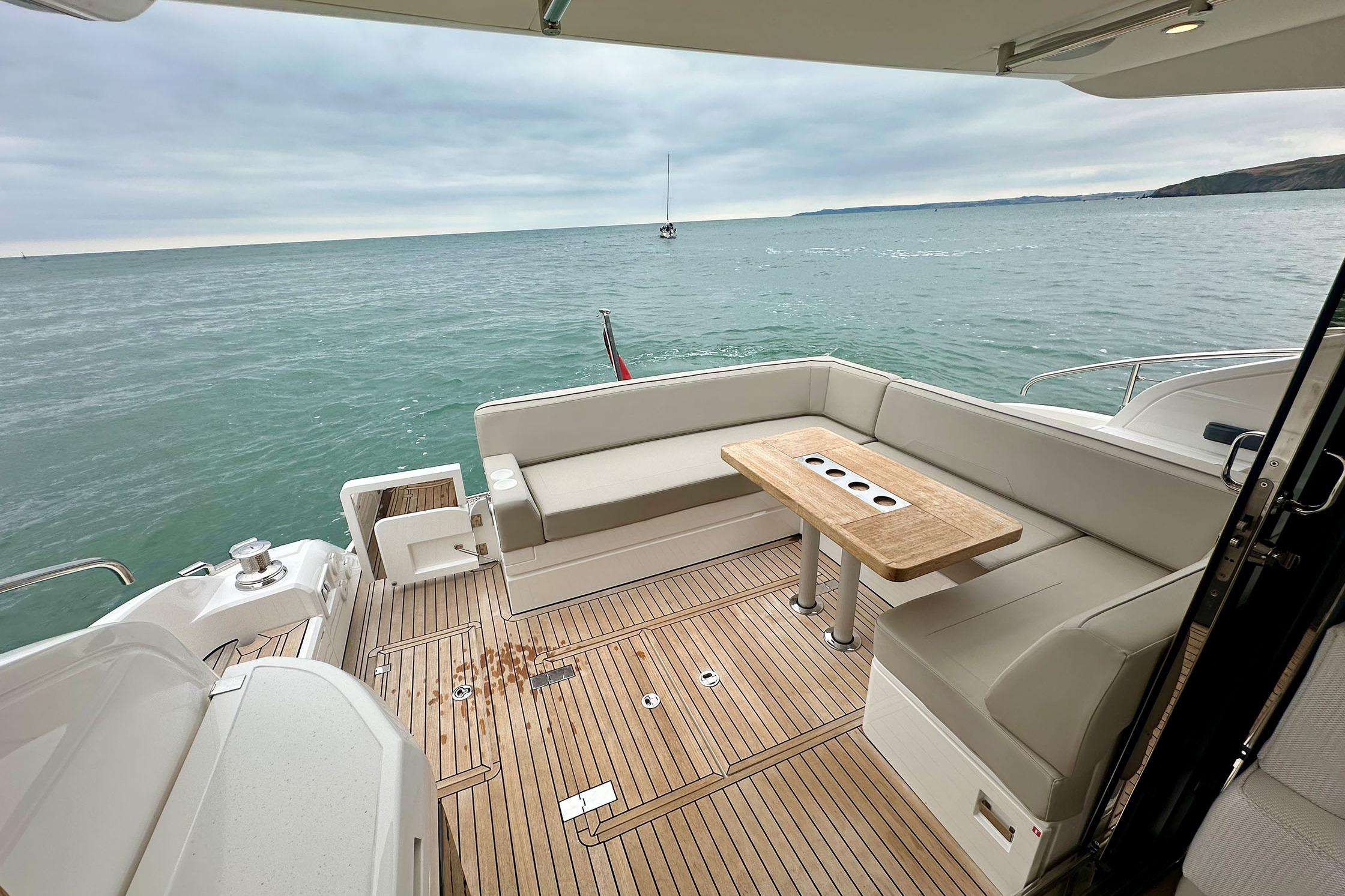 Luxury Fairline Targa 50 GT yacht deck with seating, ocean view, 2022 model.