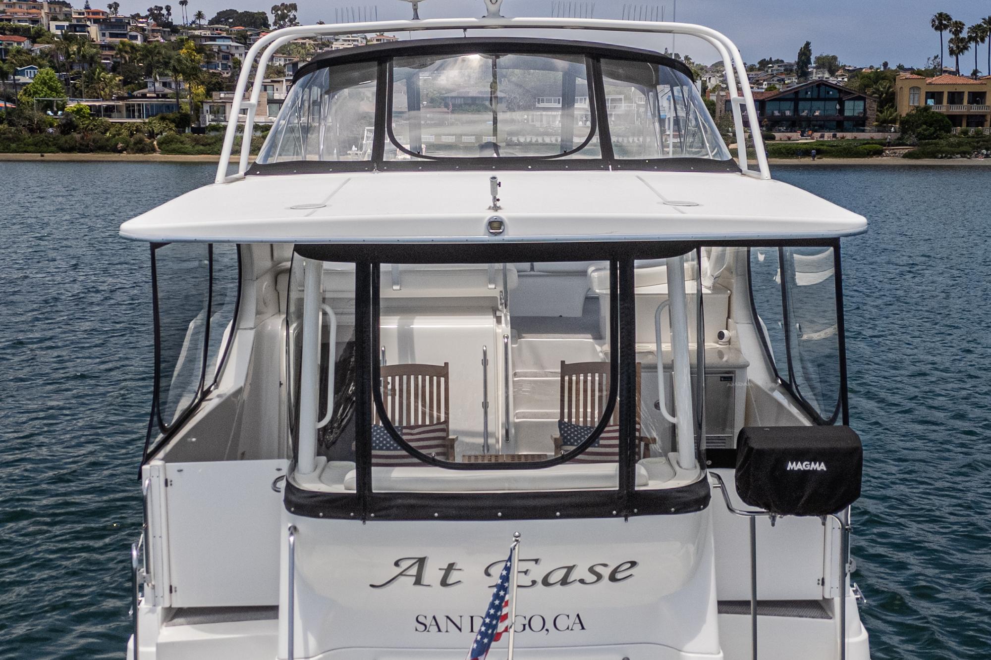 2004 Silverton 39 Motor Yacht docked in San Diego, rear view.