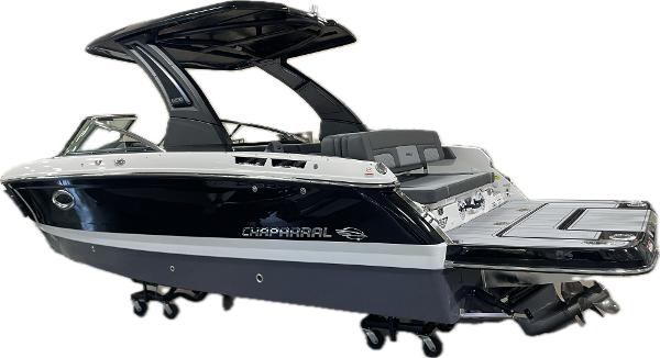 2025 Chaparral 267 SSX boat, sleek black and white design, luxury features.