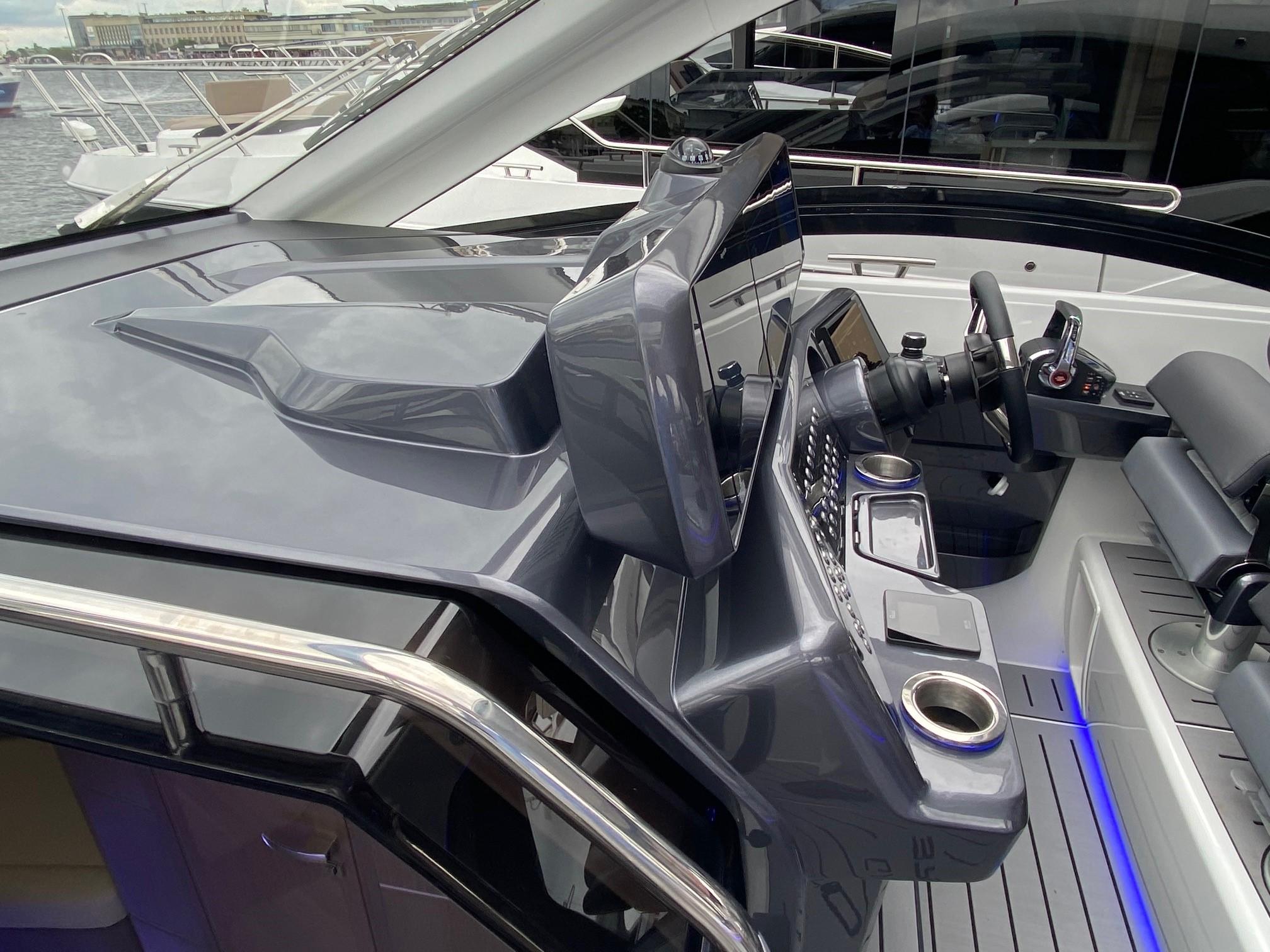 Helm of 2025 Galeon 375 GTO yacht with modern controls and sleek design.