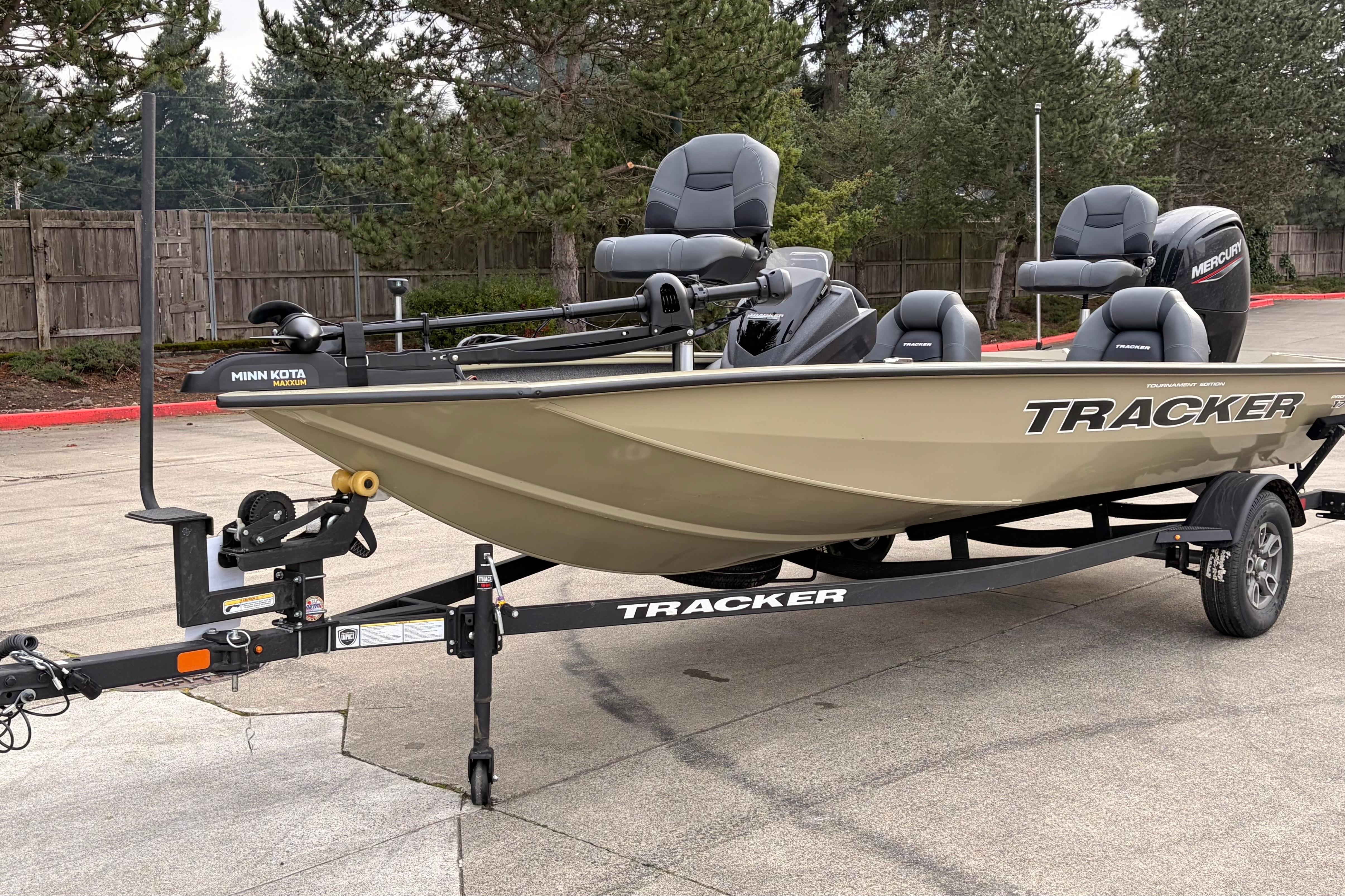 2026 Tracker Pro Team 175 fishing boat on trailer, featuring Minn Kota trolling motor.