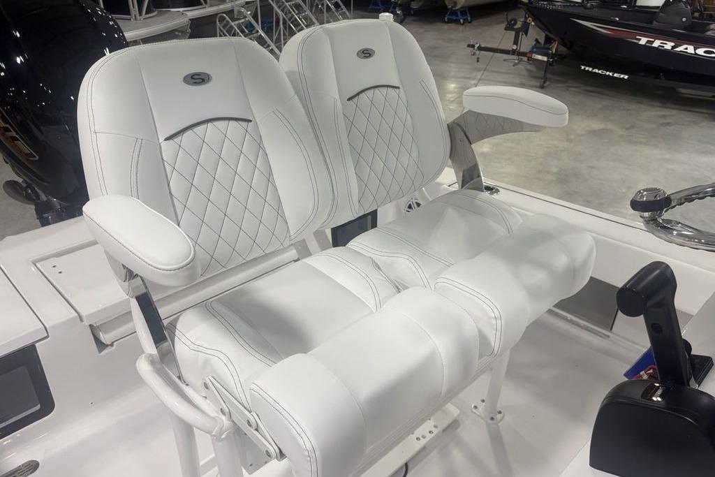 2026 Sportsman Masters 227 boat seats with white upholstery and diamond stitching.