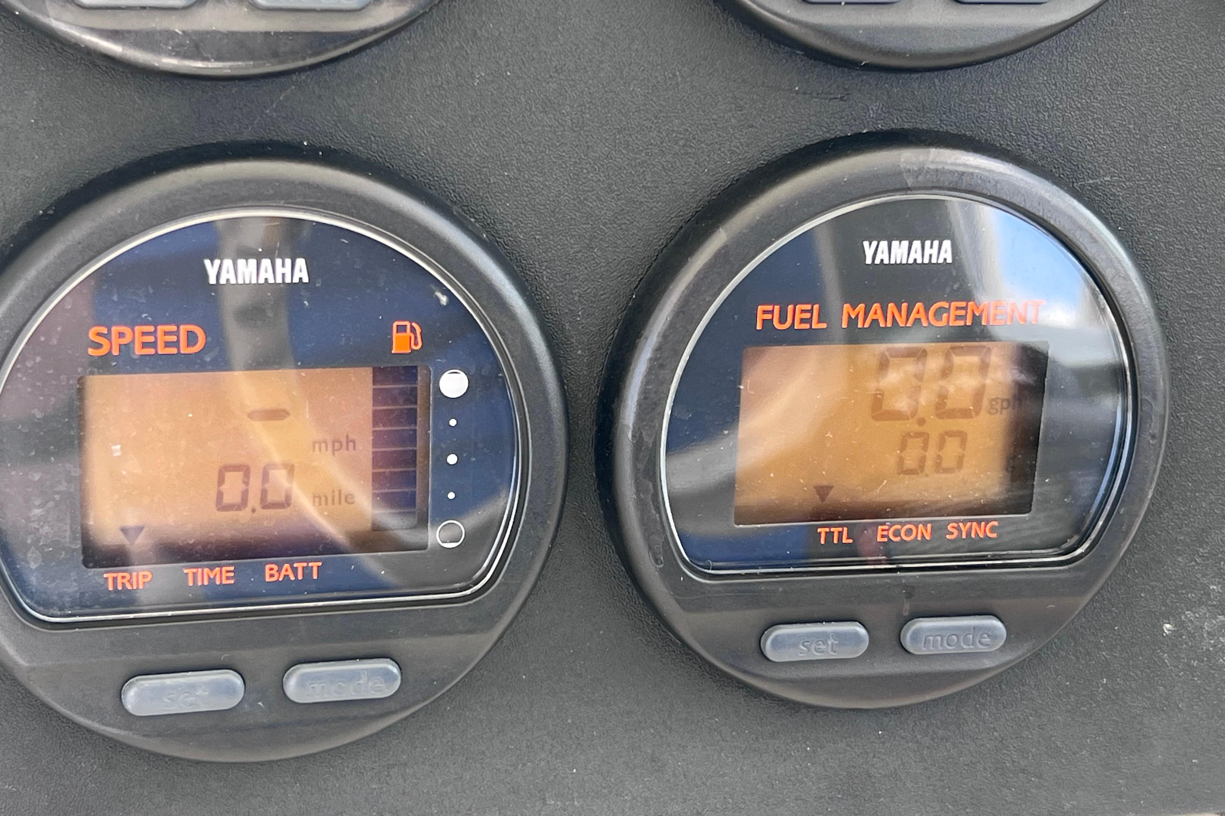 Yamaha speed and fuel management gauges on a 2004 Pursuit 2870 Walkaround boat.