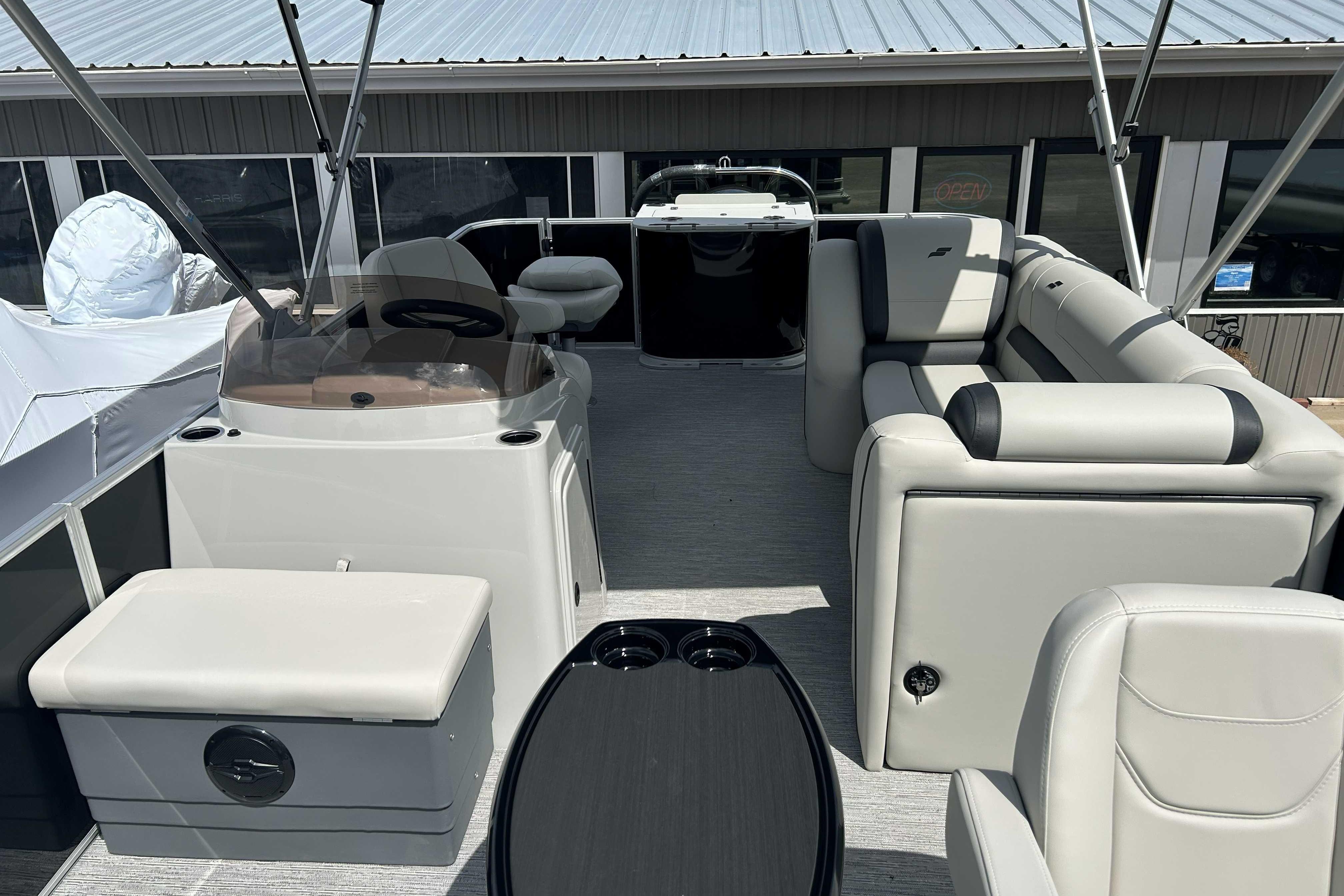 2026 Starcraft EX 22 FD pontoon boat interior with modern seating and helm.