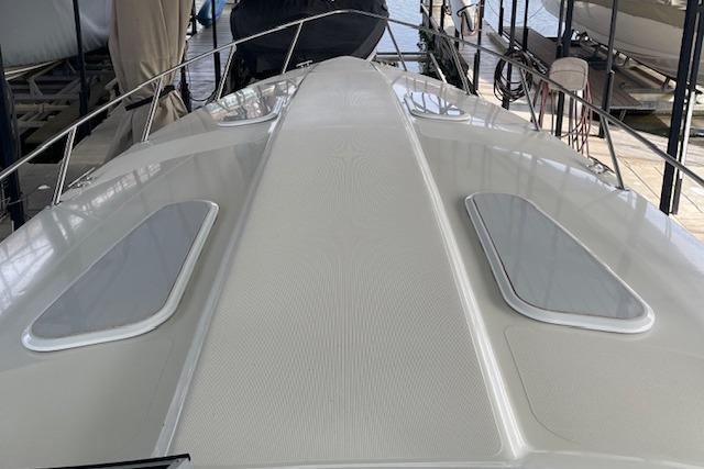 1999 Formula 400 Super Sport boat deck in a marina setting.
