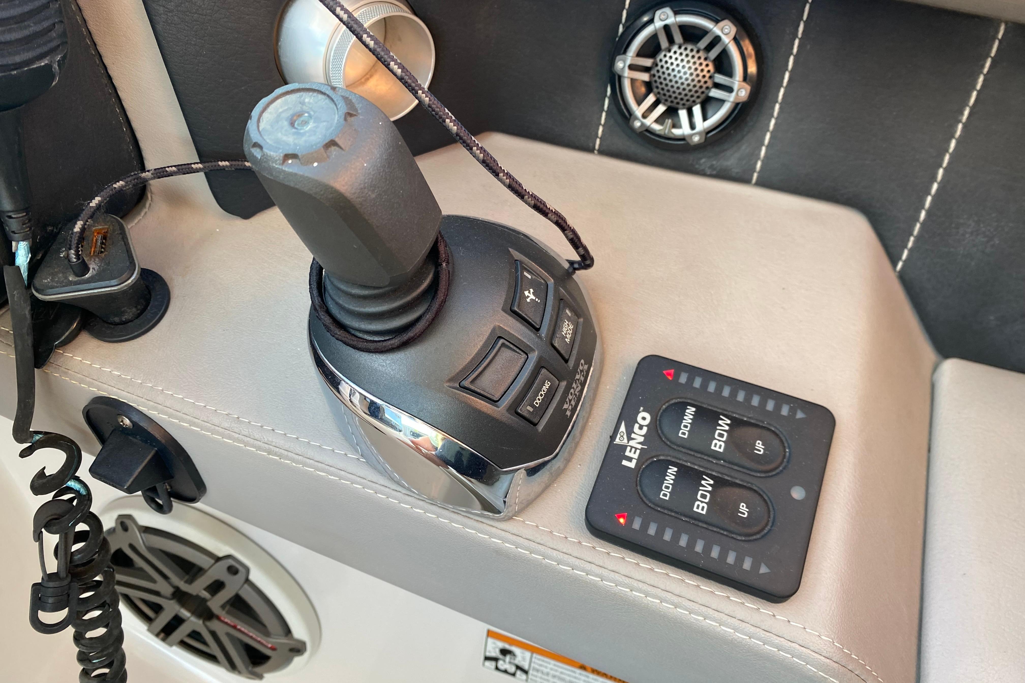 Joystick and control panel on 2017 Four Winns H350 boat dashboard.