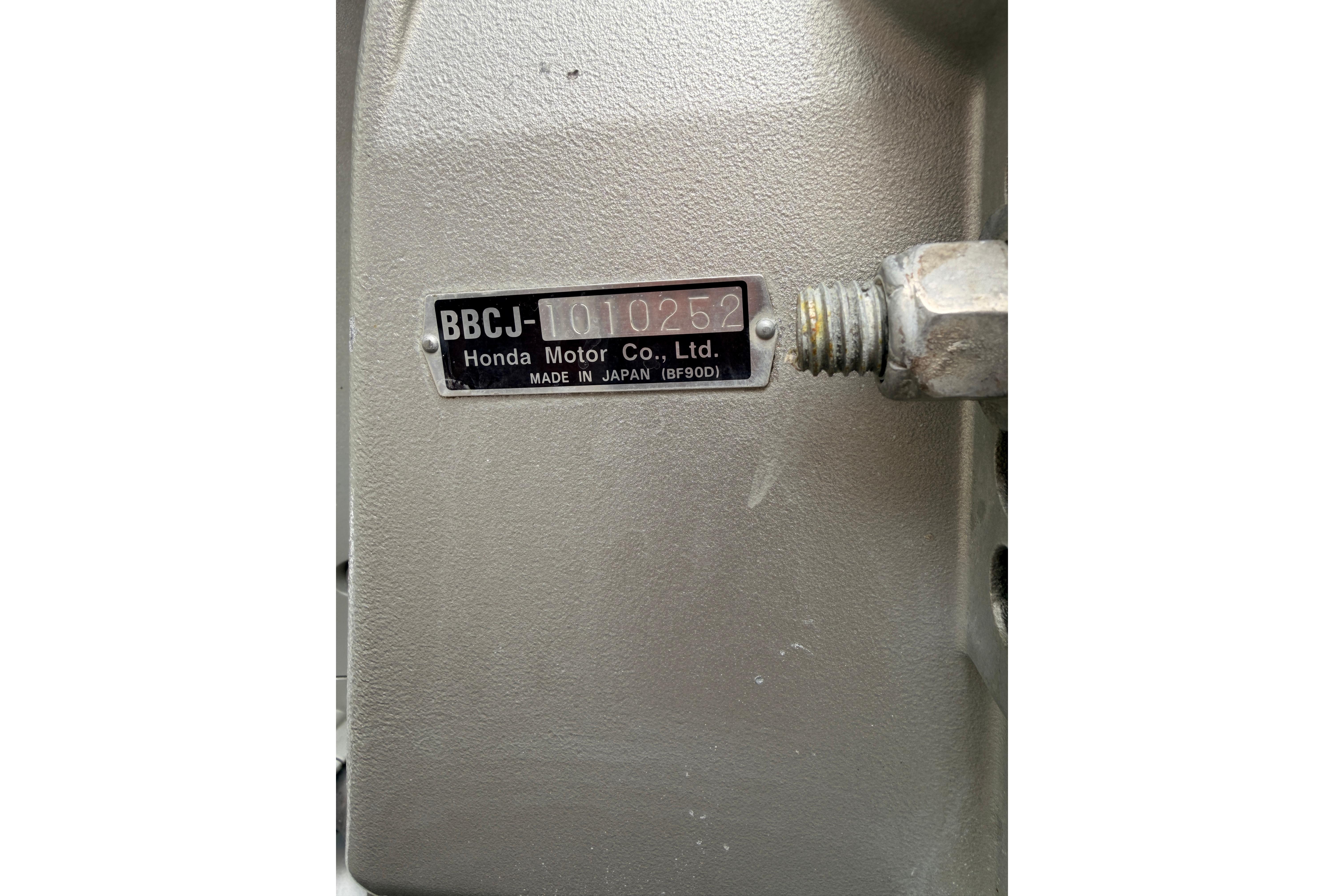 Close-up of Honda Motor Co. Ltd. engine plate on 1989 C-Dory 22' Angler.