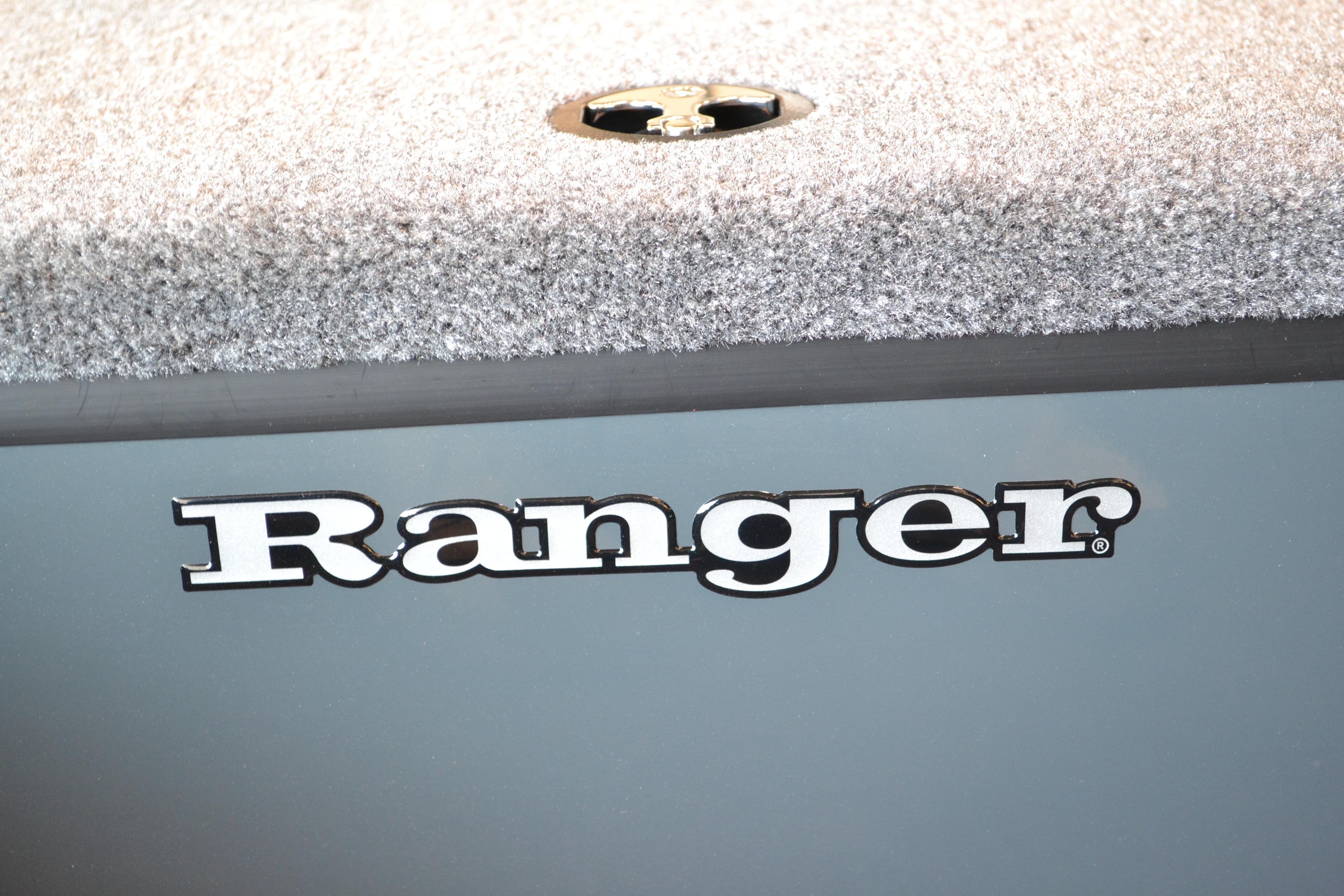 2026 Ranger RT178C boat logo on gray surface with textured carpet.