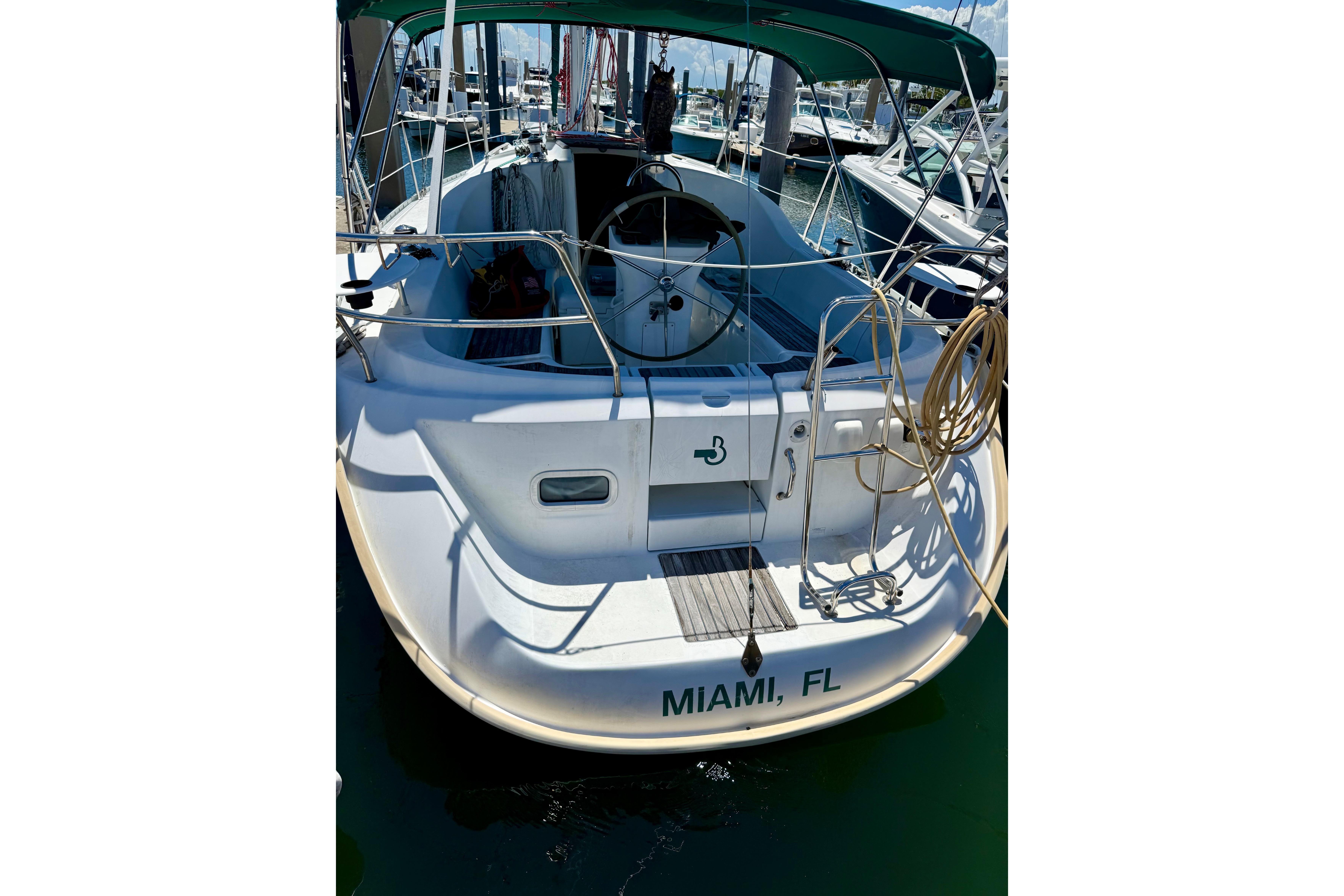 Beneteau Oceanis Clipper 311 sailboat docked in Miami, FL, 2002 model.