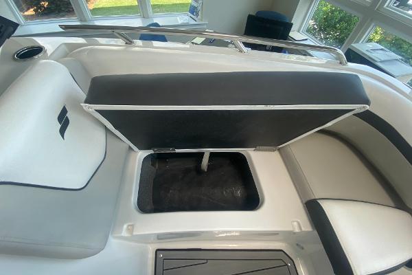 2024 Starcraft SVX 190 boat interior storage compartment with cushioned seating.