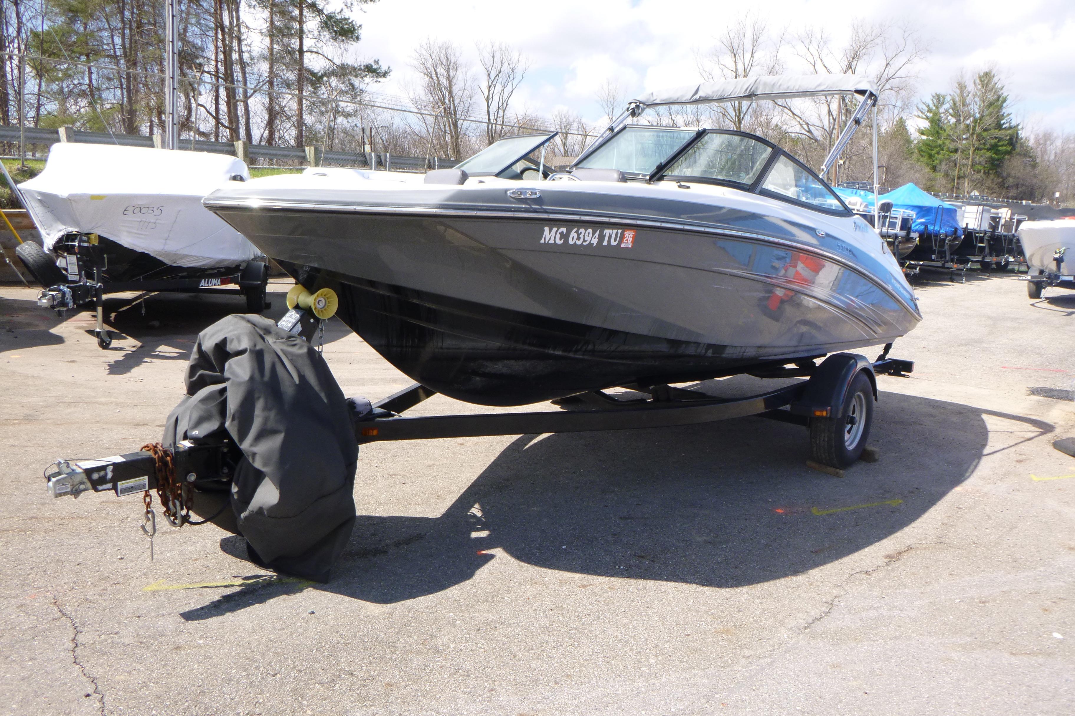 2015 Yamaha Boats SX192 on trailer in outdoor lot.
