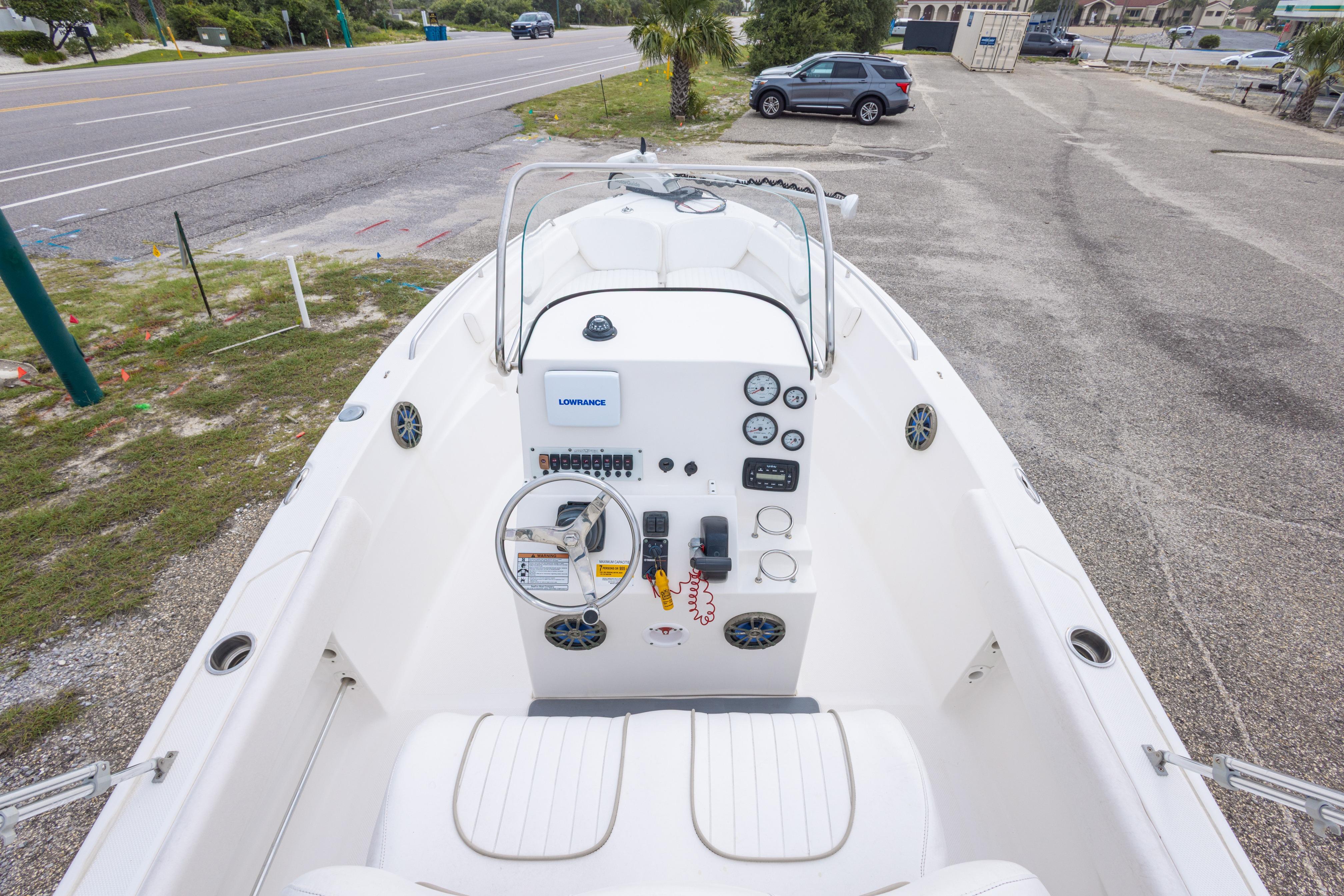 2014 Sea Fox 209 Commander boat interior with steering wheel and control panel.