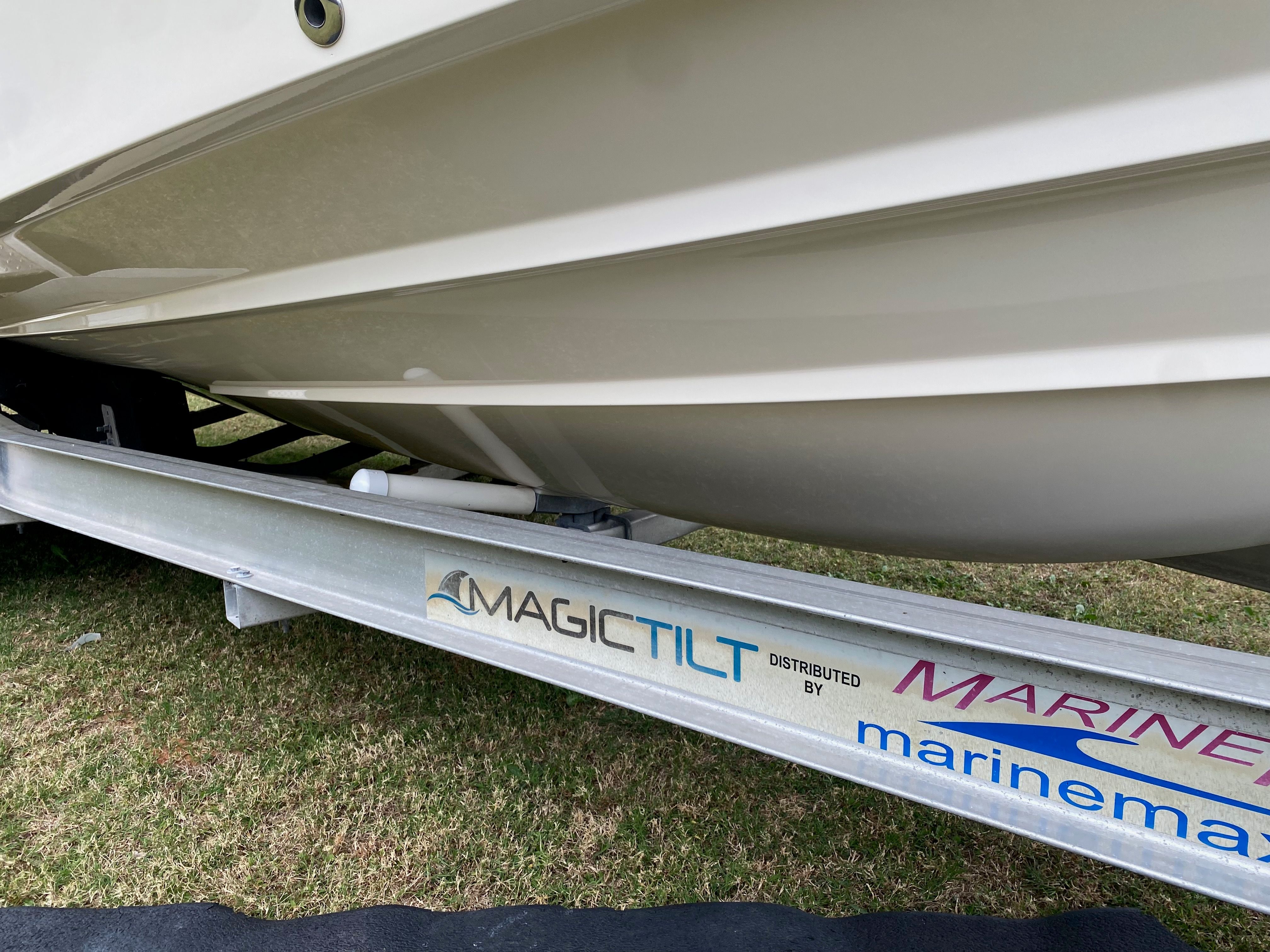 Grady-White Freedom235 boat on Magic Tilt trailer, 2018 model.