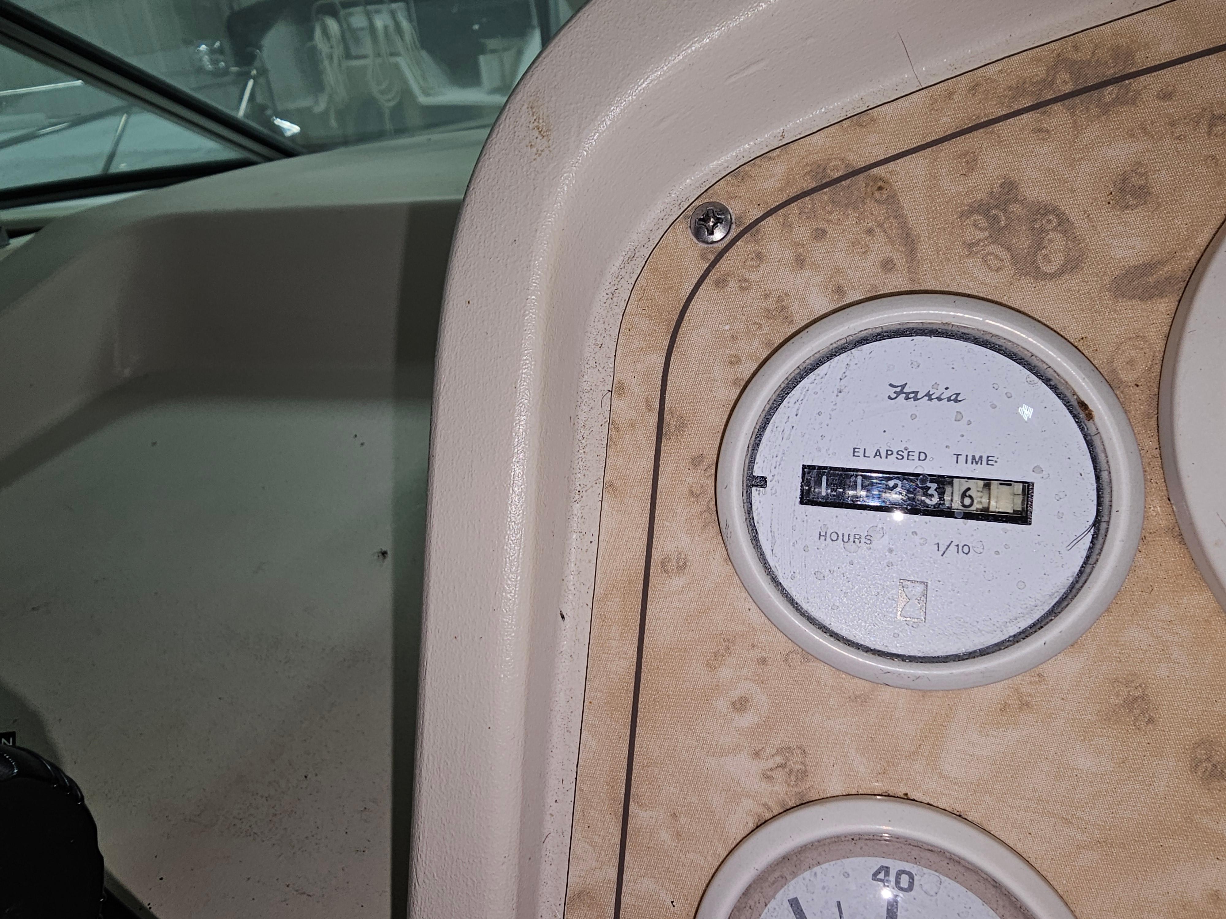 1997 Cruisers Yachts 3120 Aria dashboard with hour meter.